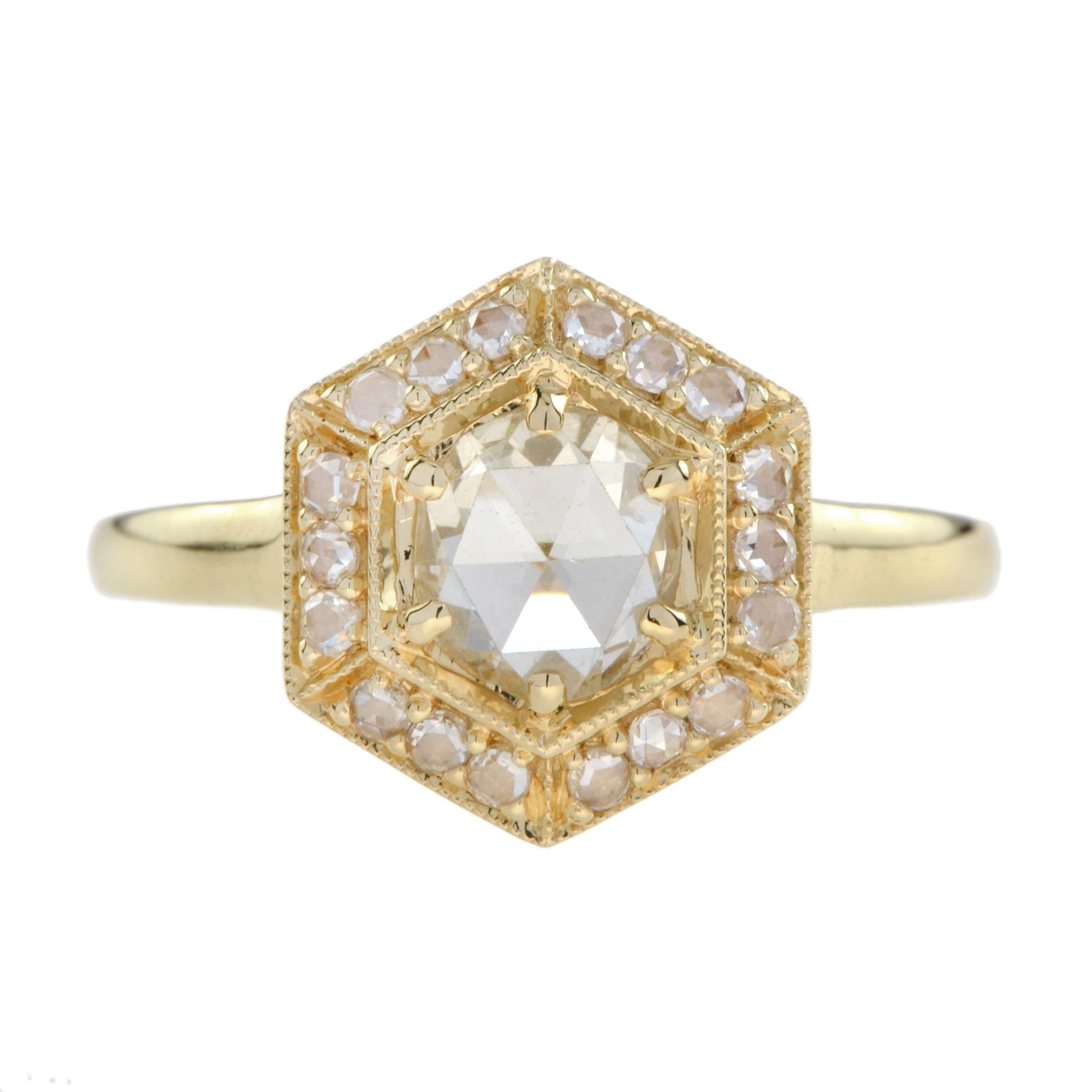 Vintage influence meets a modern, edgy design in this hexagon halo unique engagement ring. Set in a yellow gold , a 0.68 carats rose cut diamond is highlighted within a diamond set hexagonal frame that is raised to allow for seamless stacking.