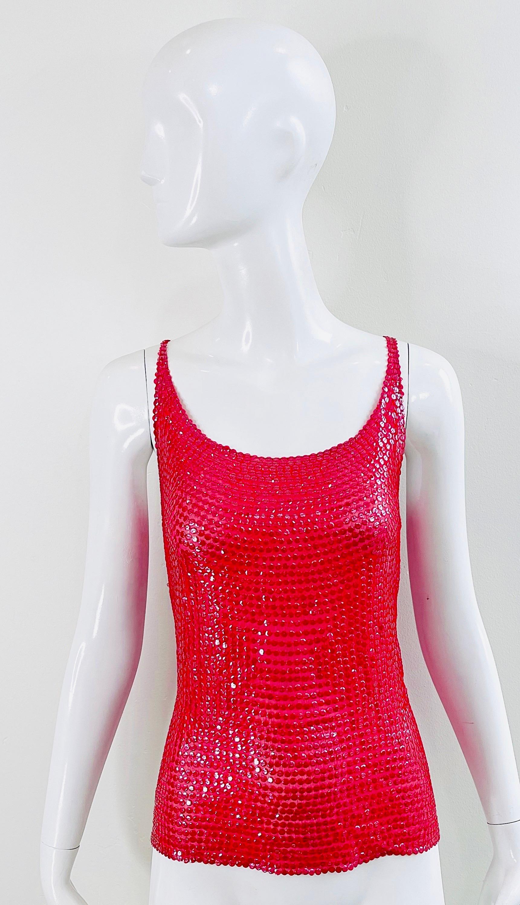 Beautiful late 1970s HALSTON lipstick / candy apple red silk chiffon sleeveless top ! This beauty comes from the Halston Sportswear line. Thousands of hand-sewn red sequins on top of a semi sheer silk chiffon. Simply slips on. Can be worn day or