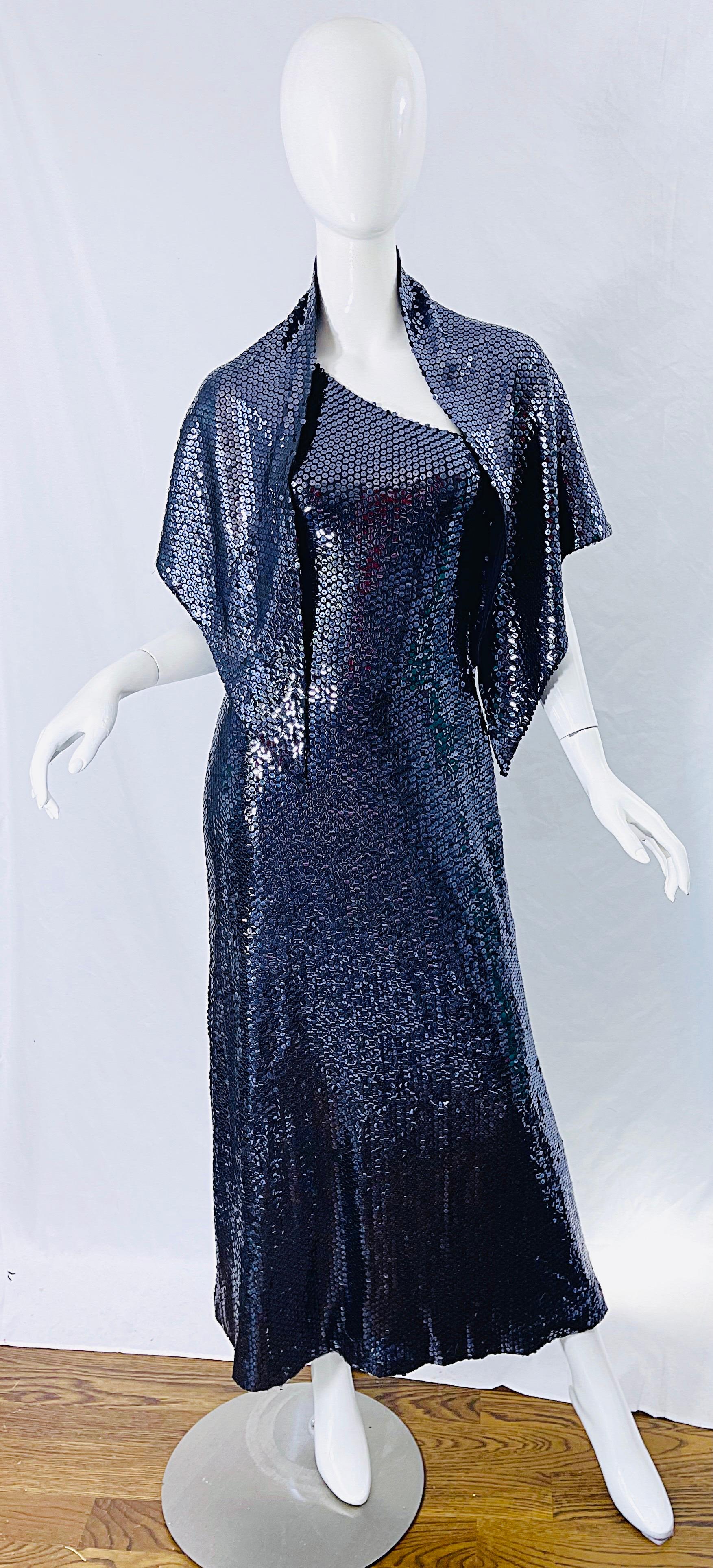 Rare and iconic 1970s HALSTON navy blue sequin one shoulder silk jersey full length disco dress and shawl ensemble ! Thousands of hand sewn sequins throughout the entire gown and shawl. Luxurious silk jersey stretches to fit. Hidden zipper up the