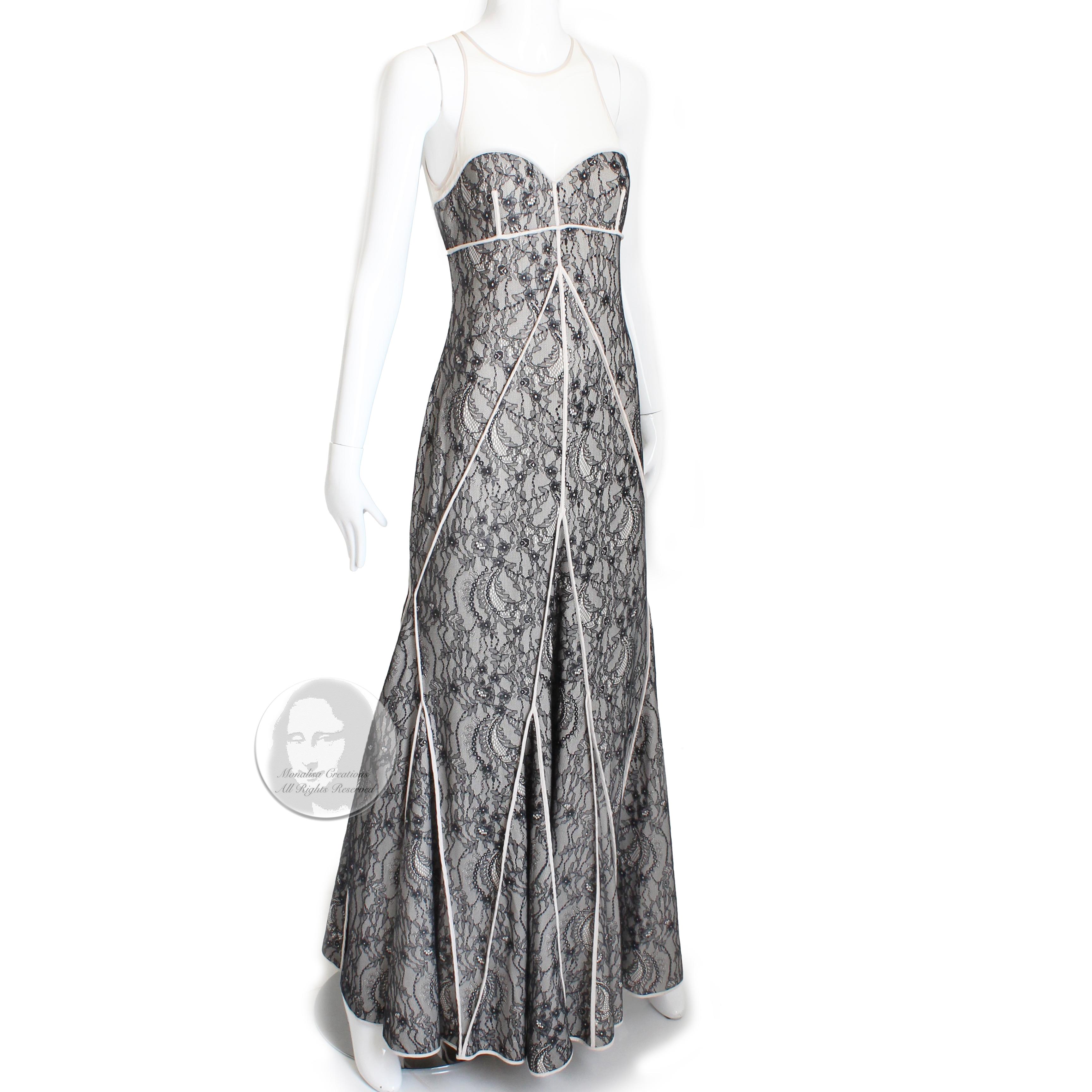 Authentic Halston Heritage long dress or evening gown, likely made post 2010. 

Made from a black and ivory illusion lace, it features a sweetheart bust line, a sheer panel scoop neck and sheer back with zipper, and a gorgeous skirt that flares with