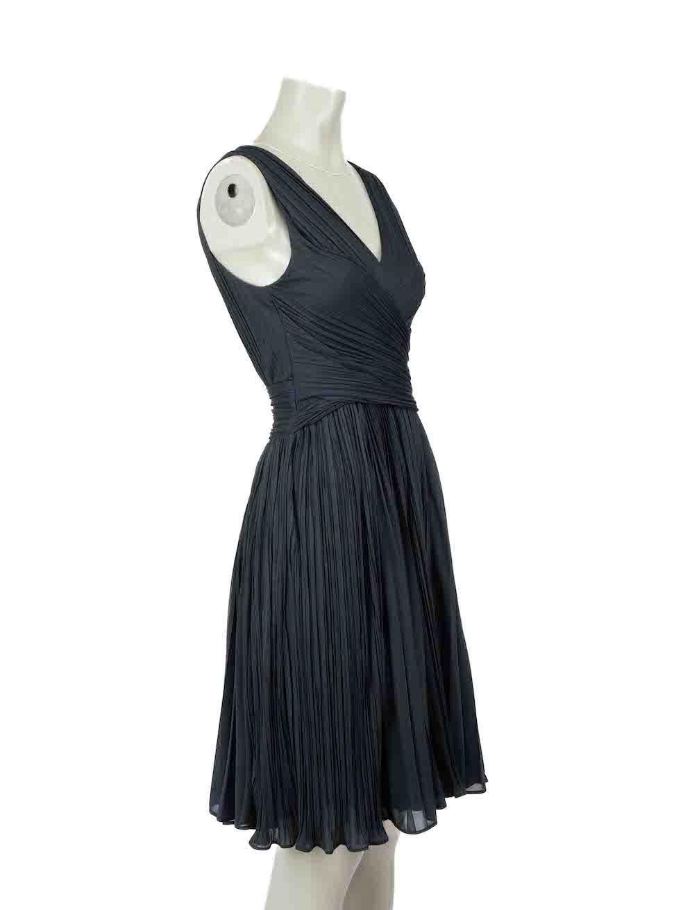 CONDITION is Good. Minor wear to dress is evident. Light wear to fabric composition with a small number of plucks to the weave at the centre back as well as mild discolouration around the neckline interior on this used Halston Heritage designer