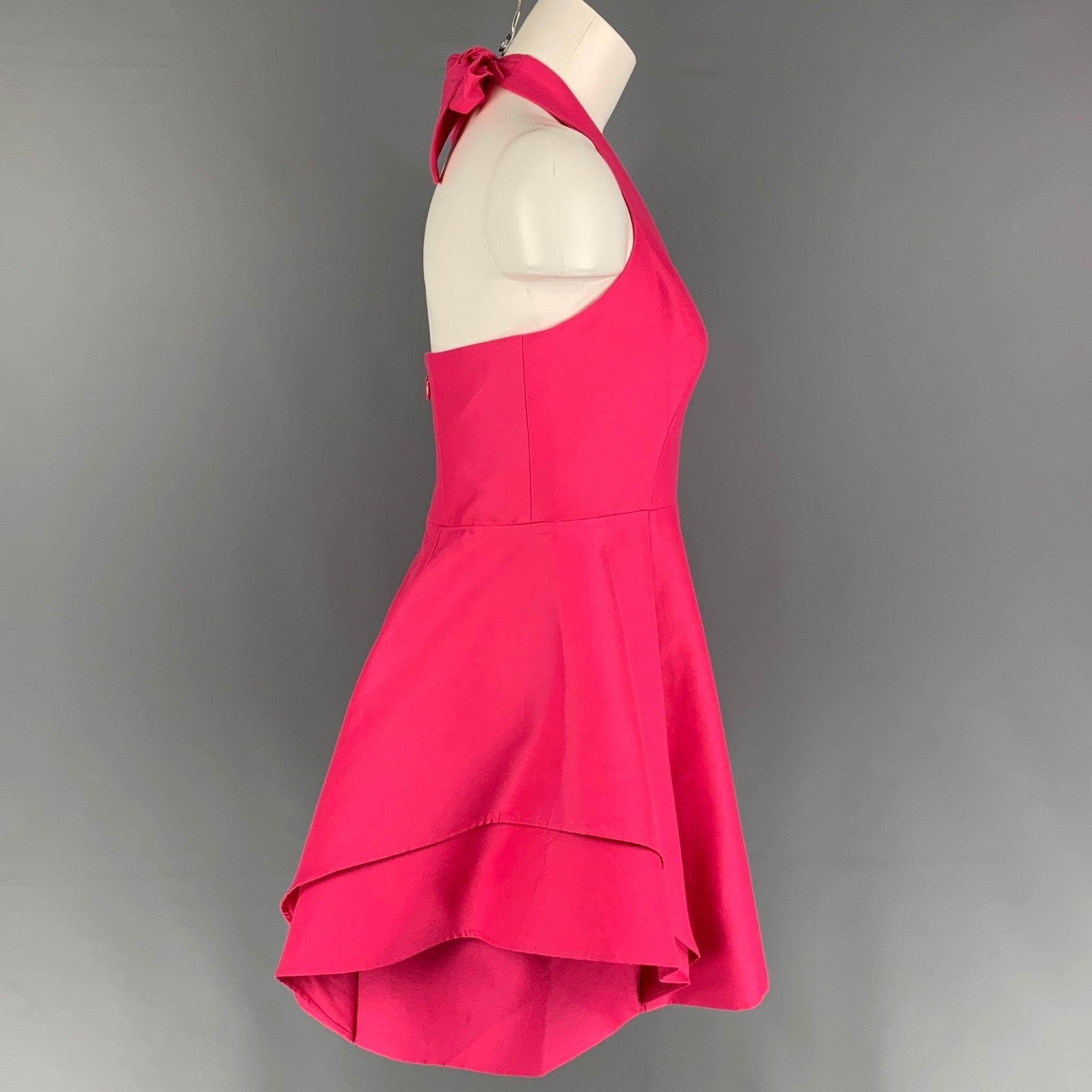 HALSTON HERITAGE dress comes in a pink cotton / silk featuring a pleated style, sleeveless, back zipper, and a top self-tie closure.
Very Good
Pre-Owned Condition. 

Marked:   10 

Measurements: 
  Bust: 30 inches  Waist: 30 inches  Hip: 40 inches 