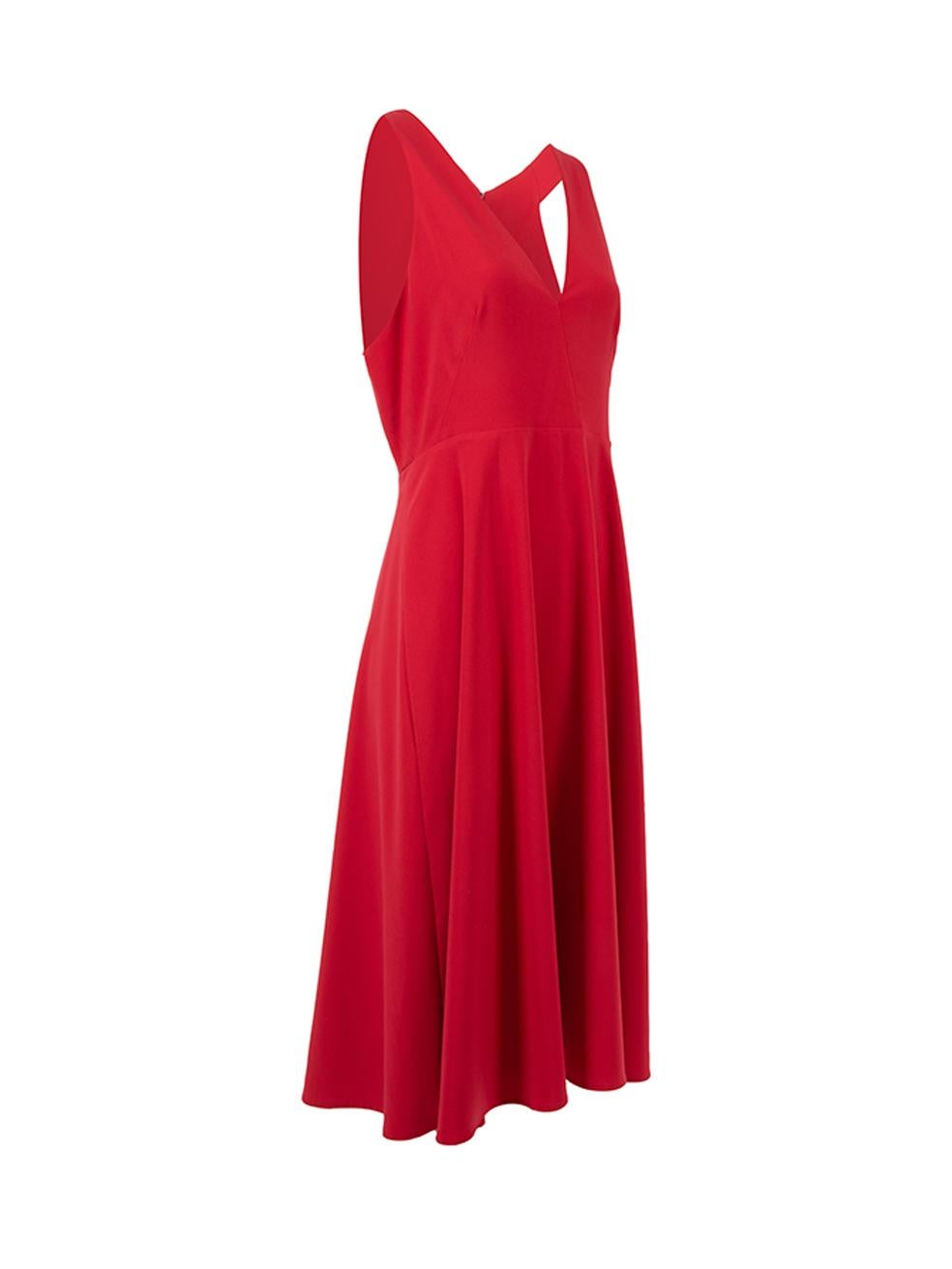 CONDITION is Very good. Minimal wear to dress is evident. Minimal wear to zipper which is scuffed and part of the material has peeled off. There is also slight pilling to the back of the neckline on this used Halston Heritage designer resale item. 
