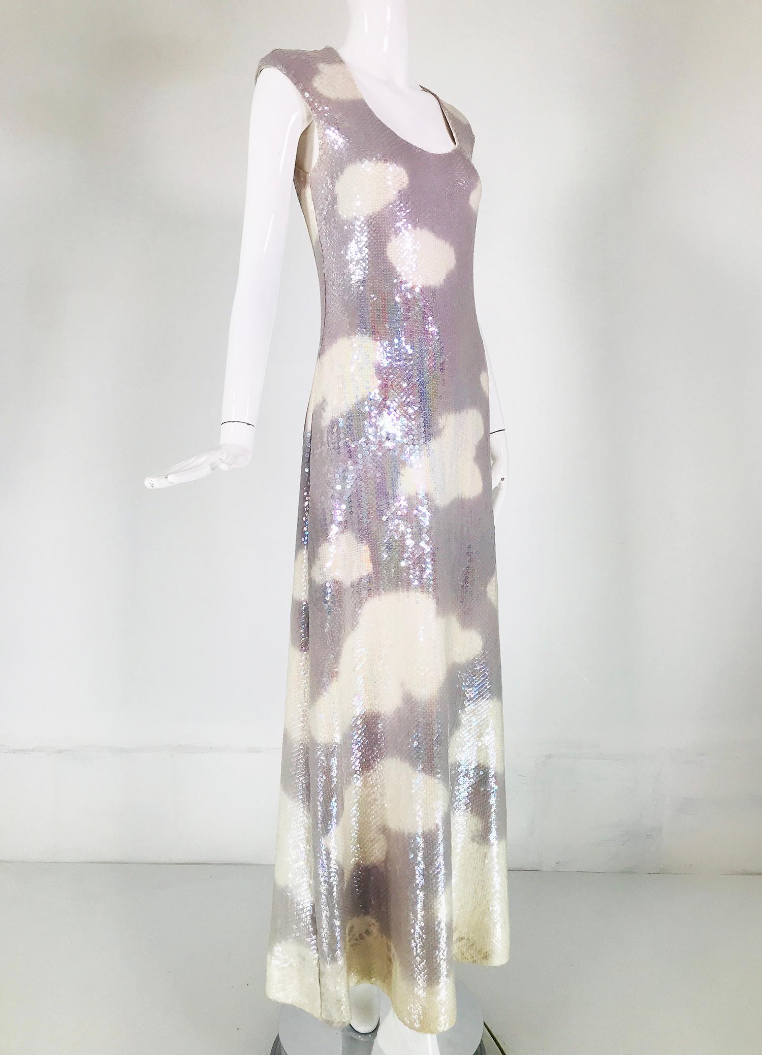Halston iconic clouds dress in stormy grey & cream with iridescent sequins from the mid 1970s. This dress is unusual as the grey is a bit darker than the dove gray that is seen more often, not that the dress turns up that frequently! Such a concept