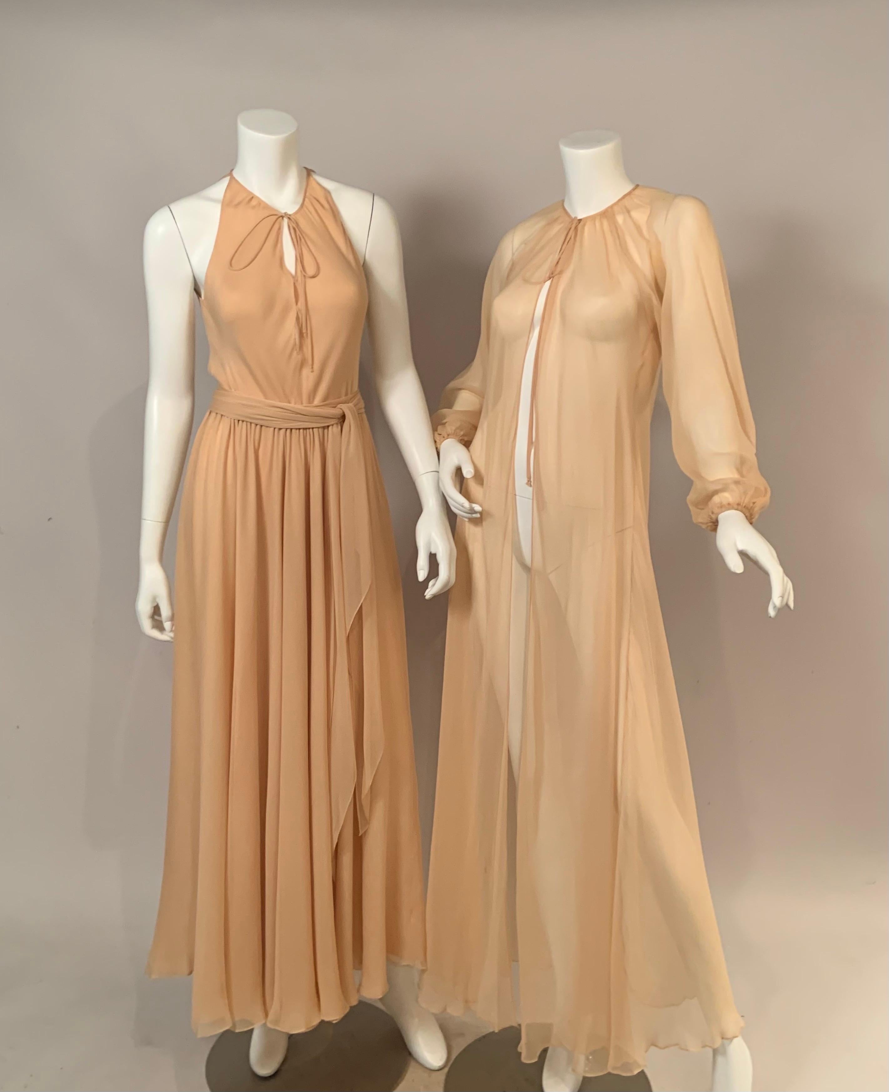 This stunning three piece outfit was designed by Halston in the late 1970's or early 1980's.  The dress is three layers of feather light silk chiffon, there is an optional tie at the neckline, three hooks and eyes below, and an elasticized