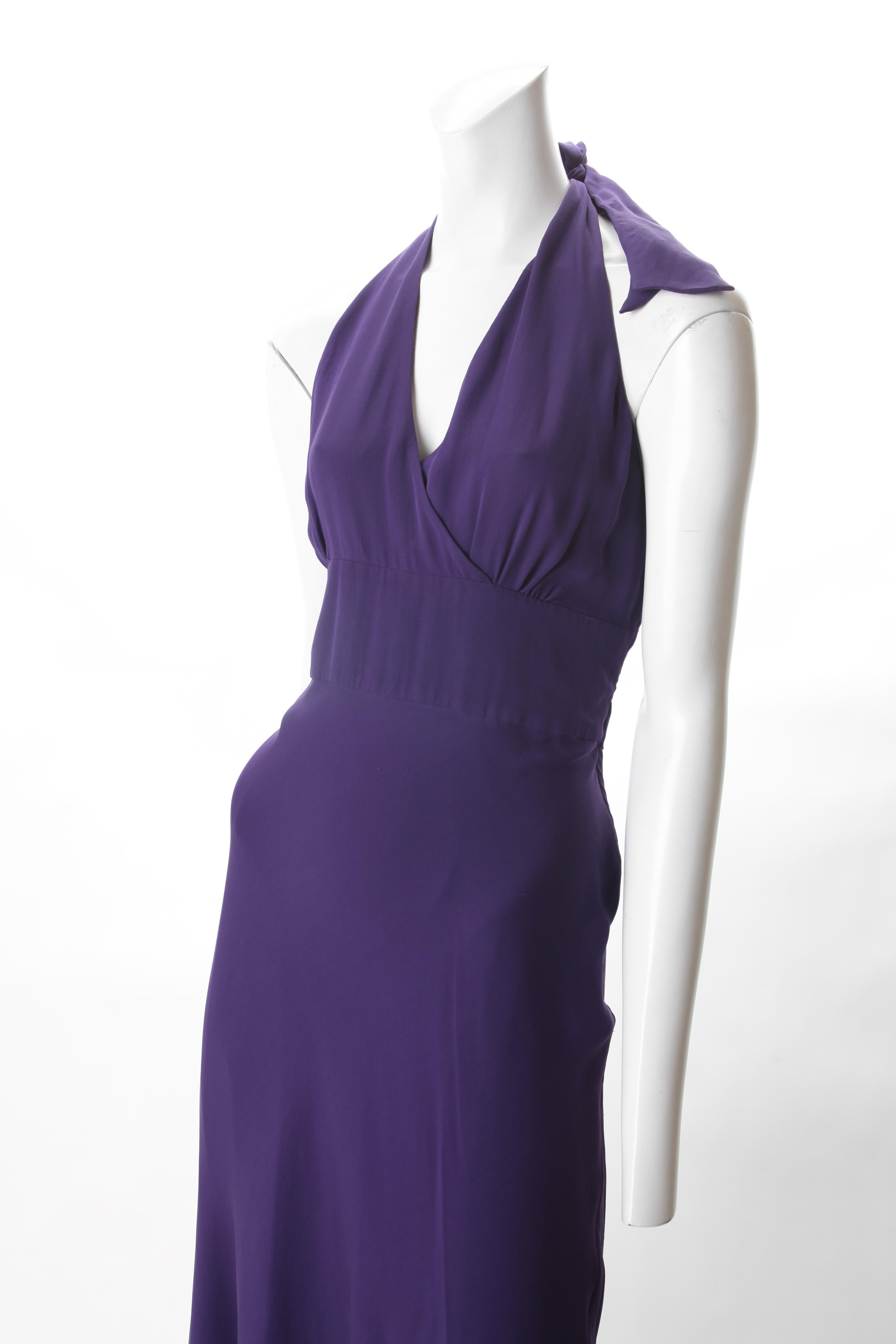 Halston Purple Chiffon Halter Dress, c.1970s.
Halston layered chiffon purple halter dress with empire bodice and handkerchief skirt. Low cut back with hidden side zipper closure and tie at neck.

Fits US Size 8.