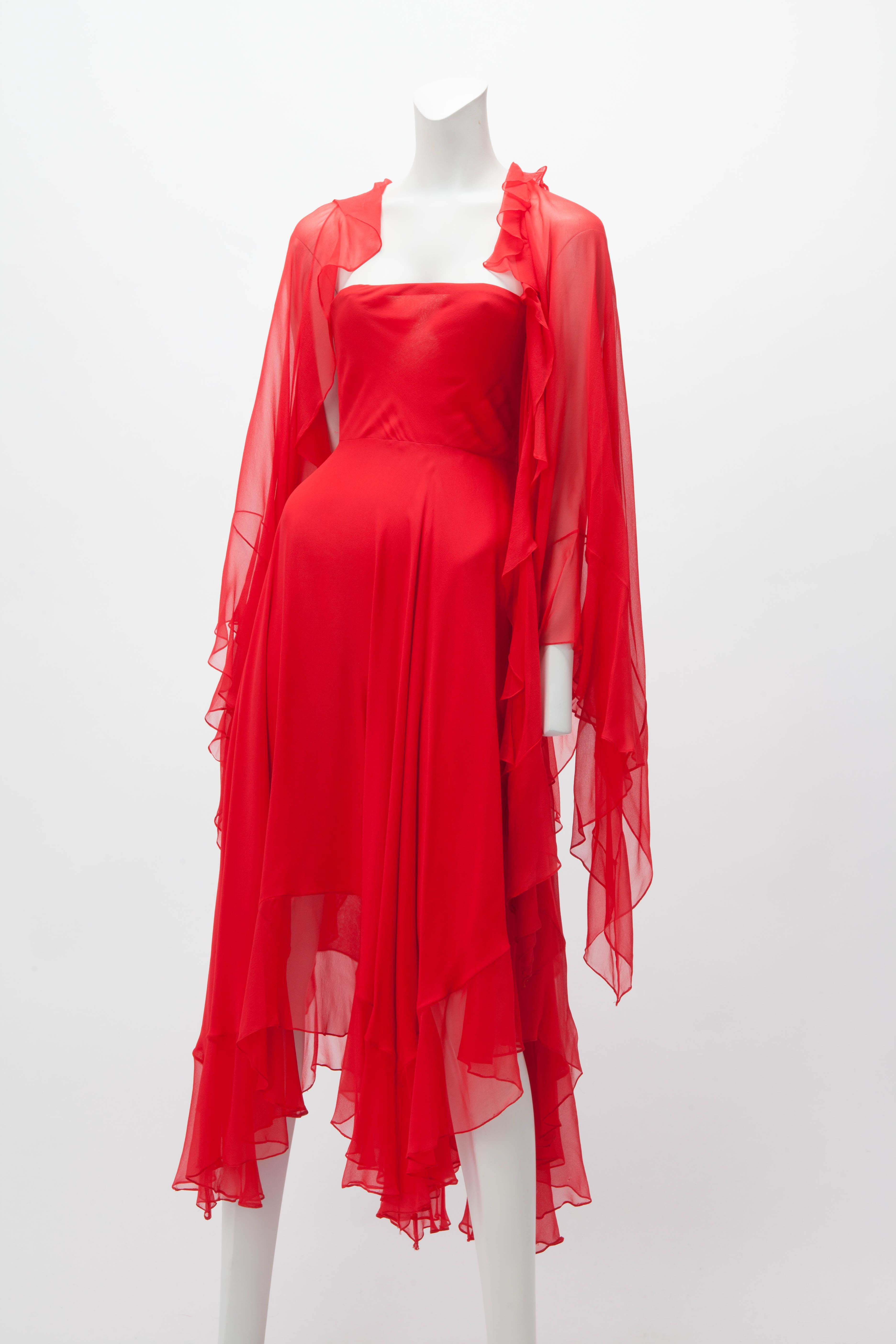 c. 1970s Iconic HALSTON red silk chiffon strapless dress with matching shawl. Demi empire waist with interior weighted stays; Side zipper fastening; Elastic trim on bodice should be replaced (wear is consistent with age and use). Full layered