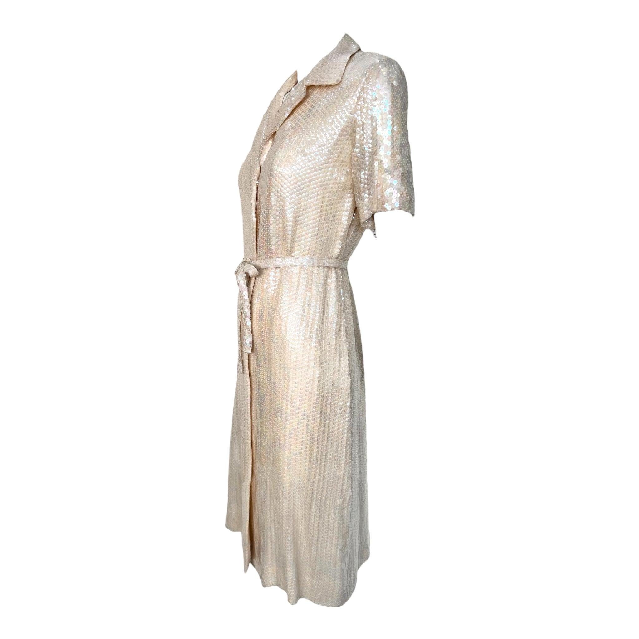 Radiant little hand-sequined 1974 Halston Resort dress. Halston began to embrace the glossy allure of full sequin silhouettes around 1973. The sequin technique he used during this time period differed from later collections. In these earlier