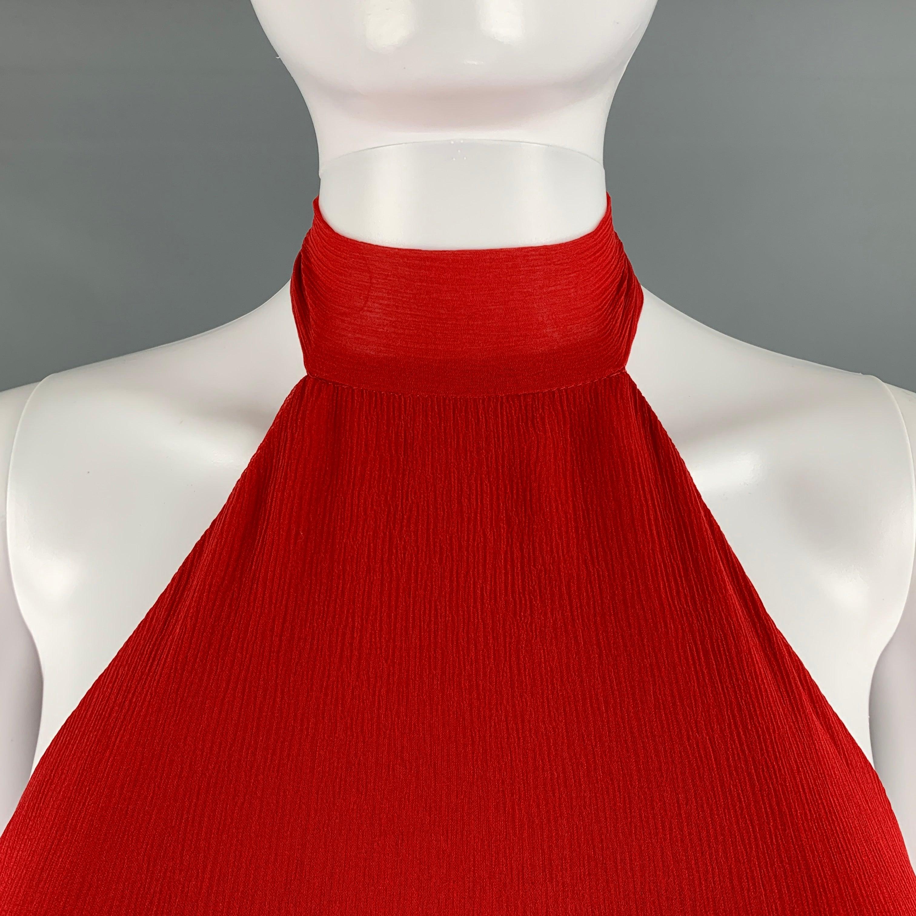 HALSTON gown comes in red silk pleated textured chiffon with a tied halter top. New with Tags. 

Marked:  
10 

Measurements: 
  Bust: 36 inches Waist: 25 inches Hip: 26 inches Length: 60 inches 
  
  
 
Reference No.: 128774
Category: Gown/Evening