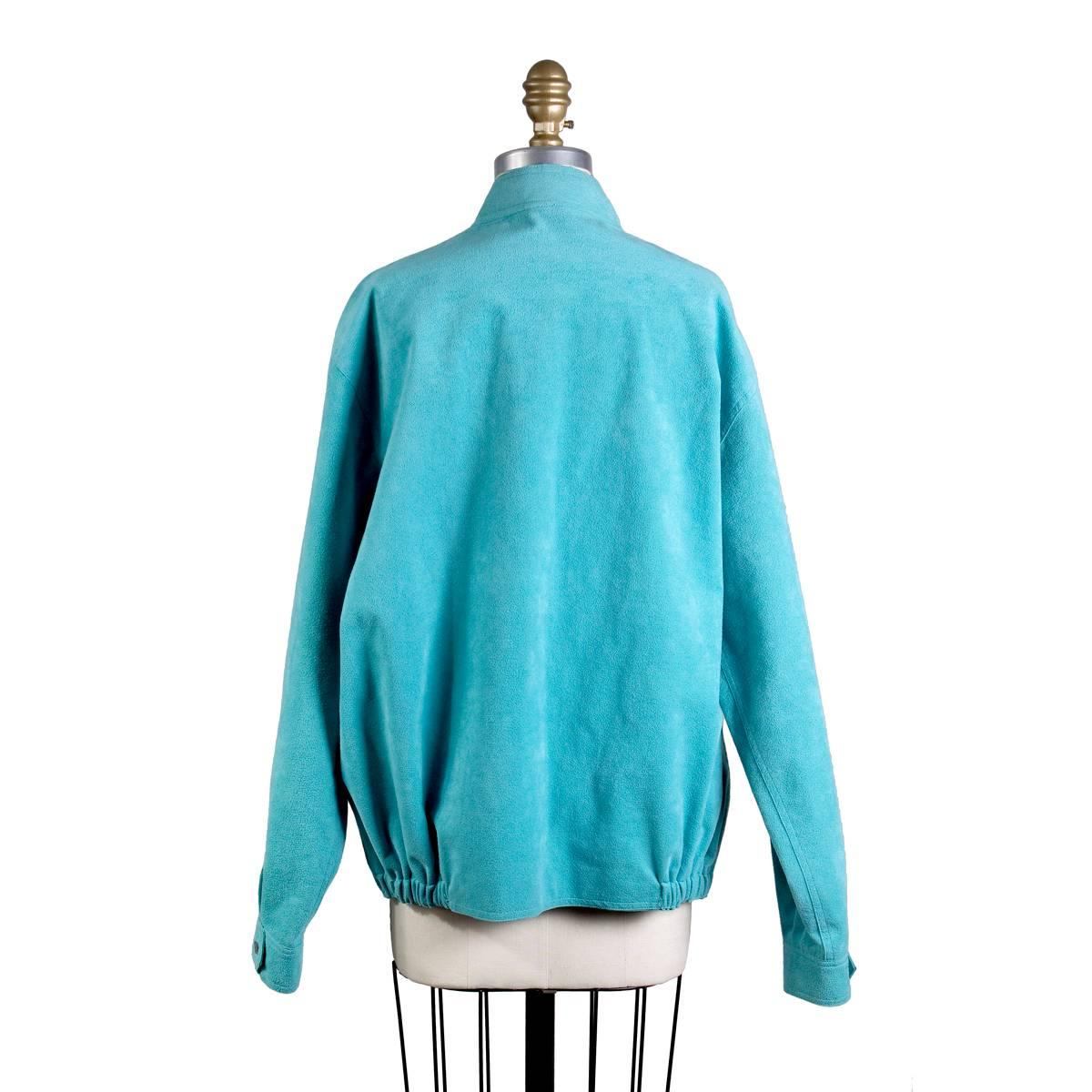 Vintage jacket by Halston circa 1970s
Part of Halston's ultrasuede series
Lightweight suede in turquoise color
Round collar with two buttons
Zip front closure
Condition: Excellent vintage condition
Size/Measurements:
18.5