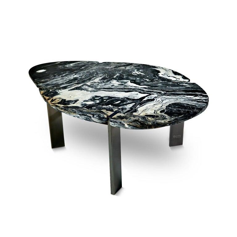 Halys coffee table black by Marble Balloon
Dimensions: H 39.5 x 88 x 130 cm
Materials: Titanium coating, stainless metal, marble

It consists of carrier legs made of titanium coating on stainless metal and a marble top.

Marble Balloon is an