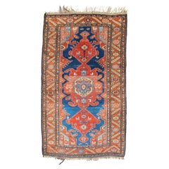 Hamadan Rug with Terracotta Medallion and Stylized Animal Motifs, Early 20th C.