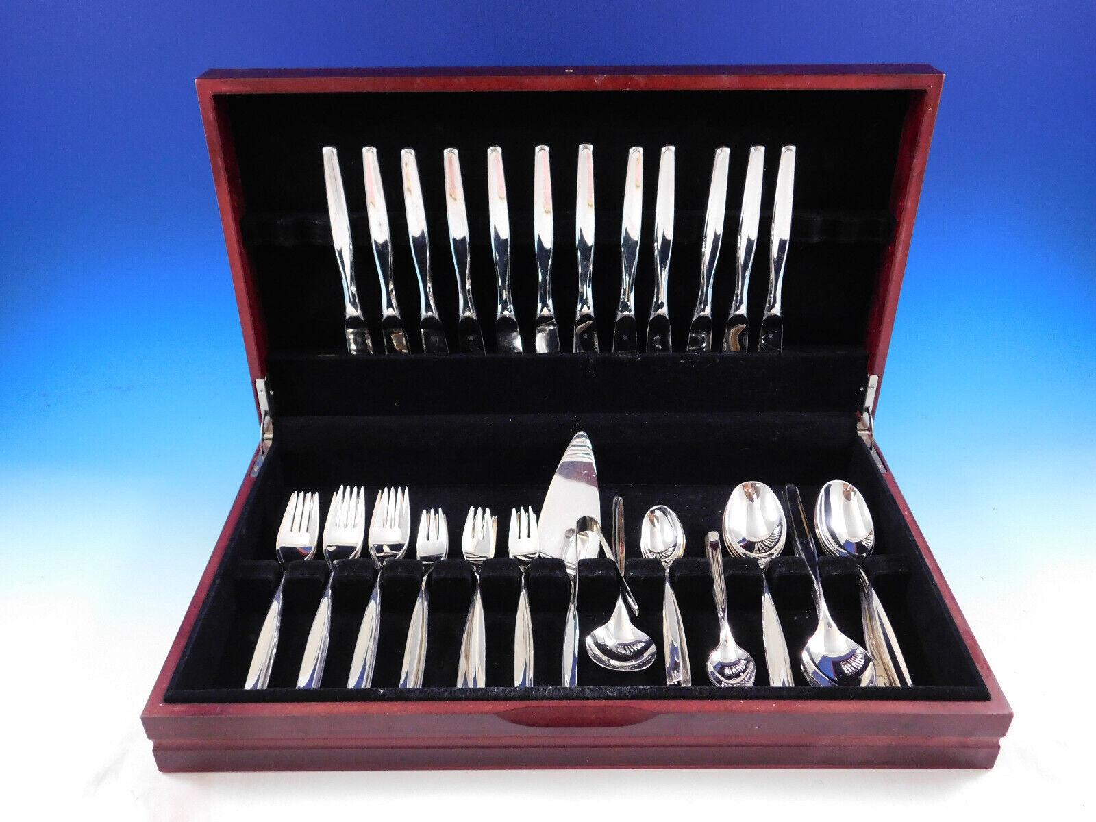 Mid-Century Modern Hamburg by WMF 800 silver German flatware set - 63 pieces. This set includes:

12 Knives, 8 3/4