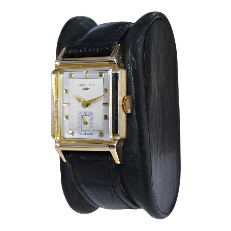 FACTORY / HOUSE: Hamilton Watch Company
STYLE / REFERENCE: Art Deco Style / Tank Style / Townsend Model
METAL / MATERIAL: 14Kt. Yellow Gold Filled
CIRCA / YEAR: 1950's
DIMENSIONS / SIZE: Length 37mm X Diameter 25mm
MOVEMENT / CALIBER: Manual 