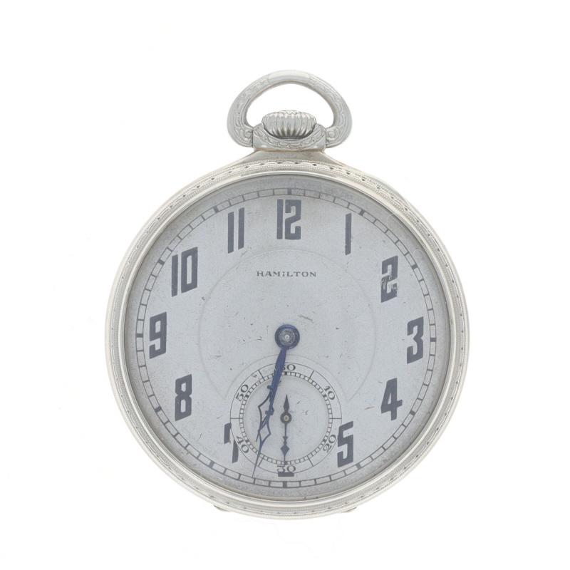 Brand: Hamilton
Model: 2
Number of Jewels: 17
Year: 1931
Dial Color: Silver

Grade: 912
Size: 12s

Metal Content: 14k White Gold

Style: Open Face
Features: 
Numbers marking the hours 
Sub dial at the 6 o'clock position

Measurements
Height