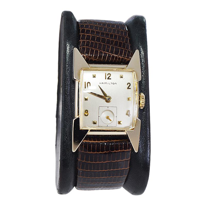 FACTORY / HOUSE: Hamilton Watch Company
STYLE / REFERENCE: Art Deco Style
METAL / MATERIAL: Yellow Gold Filled
CIRCA / YEAR: 1950's
DIMENSIONS / SIZE: 24mm x 37mm
MOVEMENT / CALIBER: Manual Winding / 22 Jewels / Cal.770
DIAL / HANDS: Brushed Silver