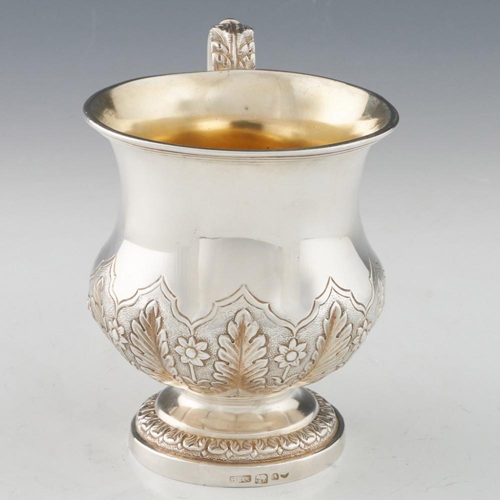 Heading : Hamilton & Co Indian silver half pint tankard
Date : Hallmarked in Calcutta c1870 for Hamilton & Co
Period : British Raj
Origin : Calcutta, India
Decoration : George IV style. Waisted bowl withh gadrooned base and chased and repousse
