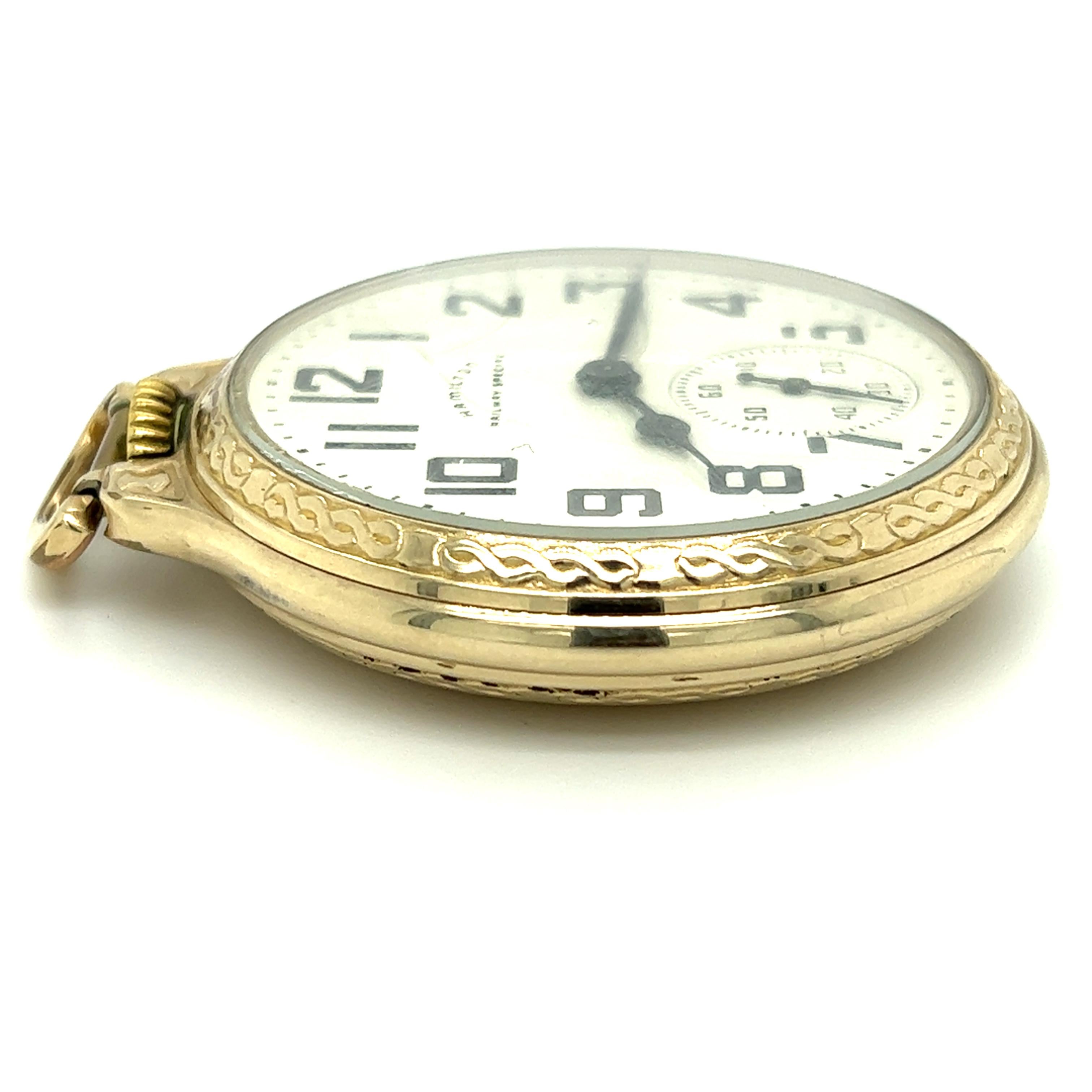 One 10 karat yellow gold filled 16 size Hamilton Watch Co. Hamilton Railway Special open face pocket watch.  The movement is manual wide, lever set, signed 992B, has 21 jewels, with serial number C454351. Production date is 1957. The watch is
