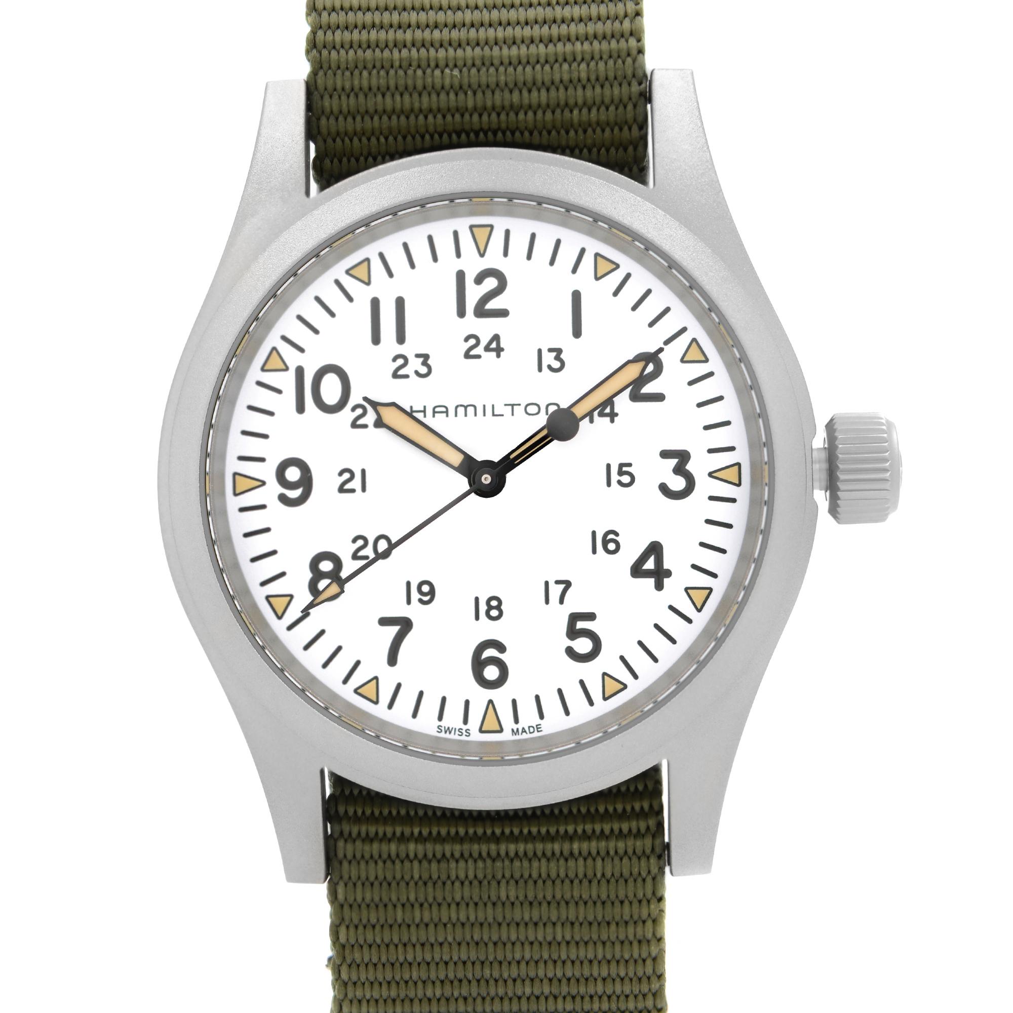 Unworn Hamilton Khaki Field Mechanical Men's Watch H69439411. This Beautiful Timepiece Features: Matt Stainless Steel Case and Two-Piece Textile Strap. Fixed Stainless Steel Bezel. White Dial with Black Luminous Hands And Arabic Numeral Hour