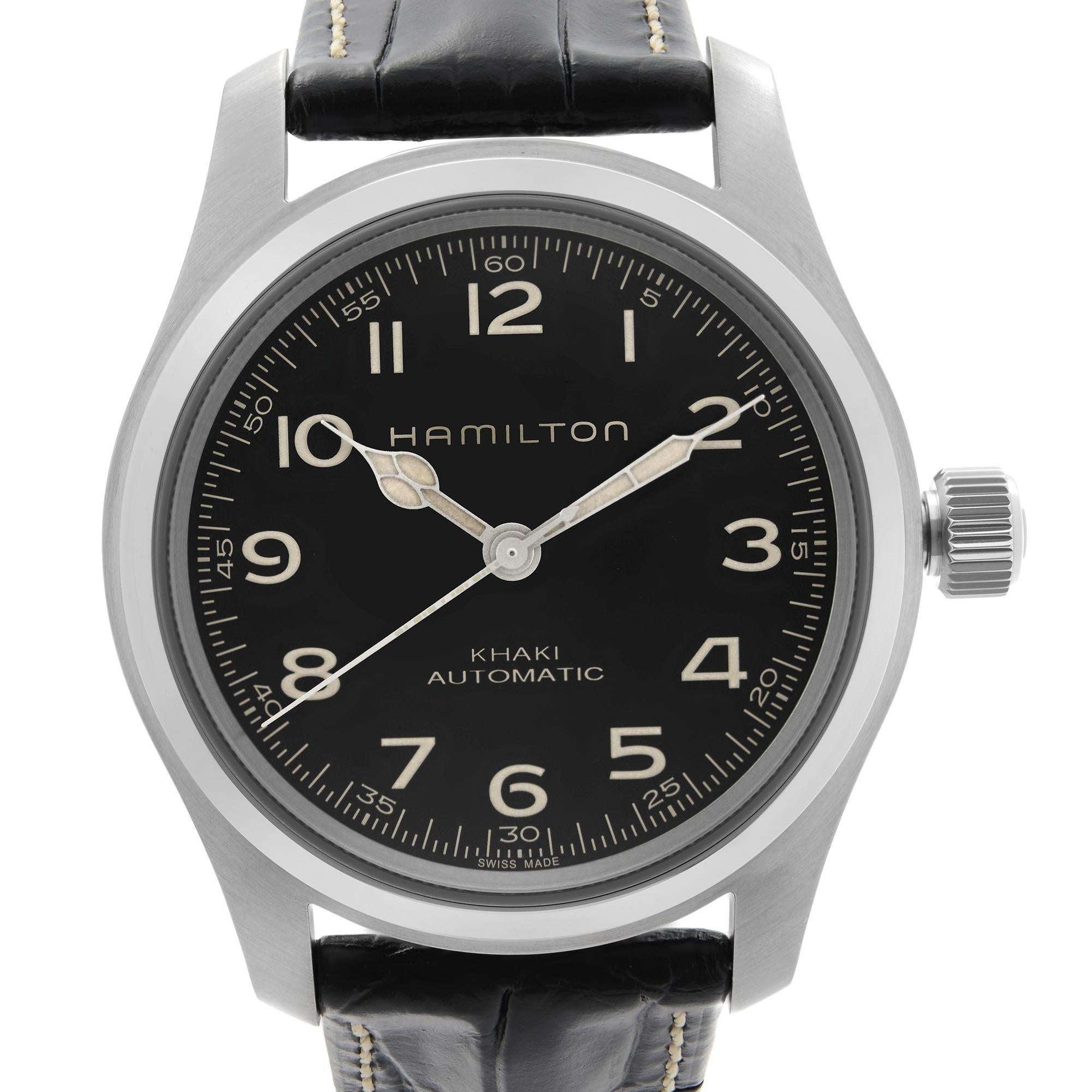Unworn Hamilton Khaki Field Men's Watch H70605731. This Beautiful Timepiece Features: Stainless Steel Case and Two-Piece Leather Strap. Fixed Stainless Steel Bezel. Black Dial with Luminous Silver-tone Cathedral-style Hands And Arabic Numeral Hour