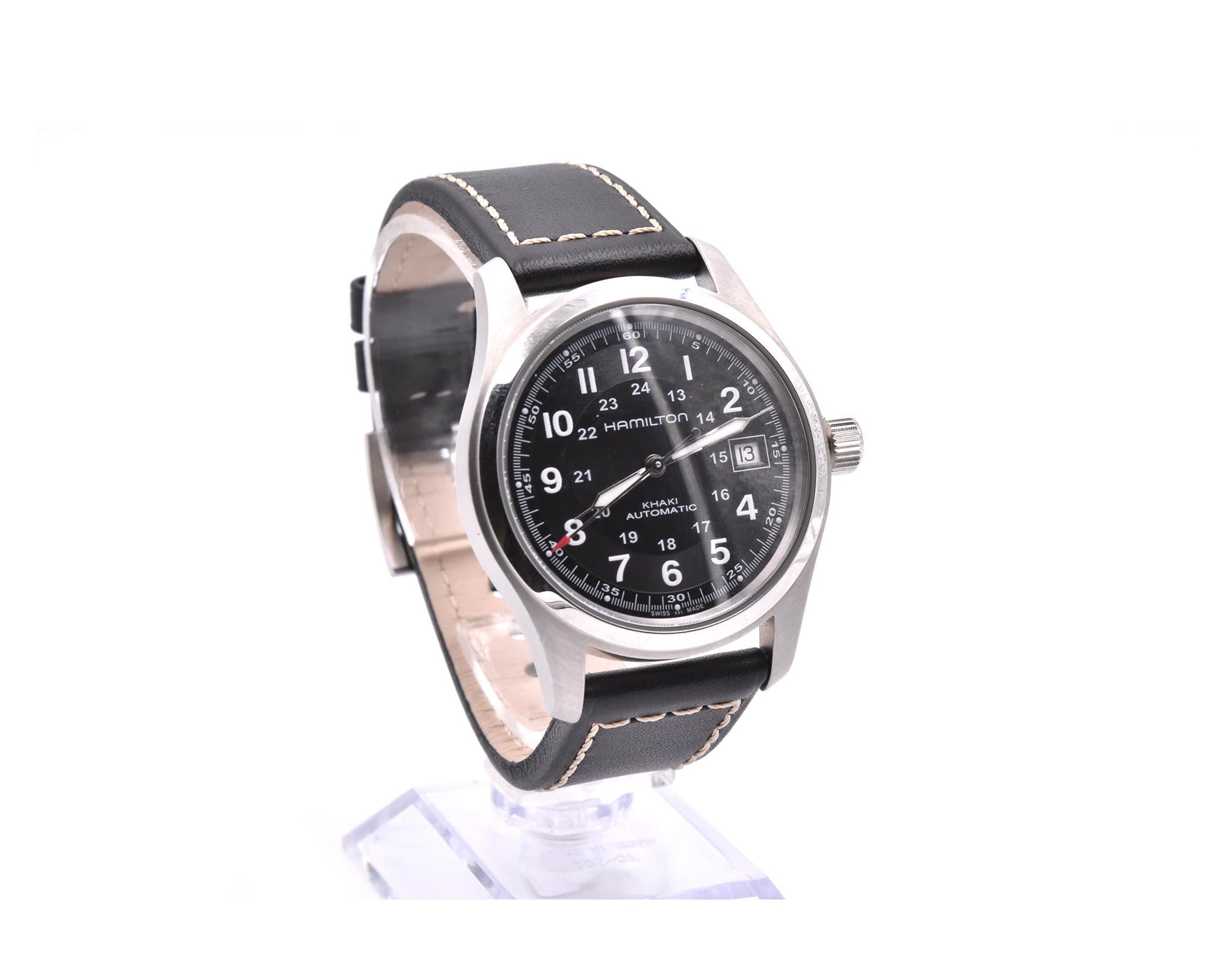 Movement: automatic
Function: hours, minutes, date
Case: 38mm stainless steel case, sapphire crystal, see-through case-back, pull/push crown
Dial: black dial with Arabic numbers, silver luminescent hands, date at 3 o’clock
Bracelet: black leather