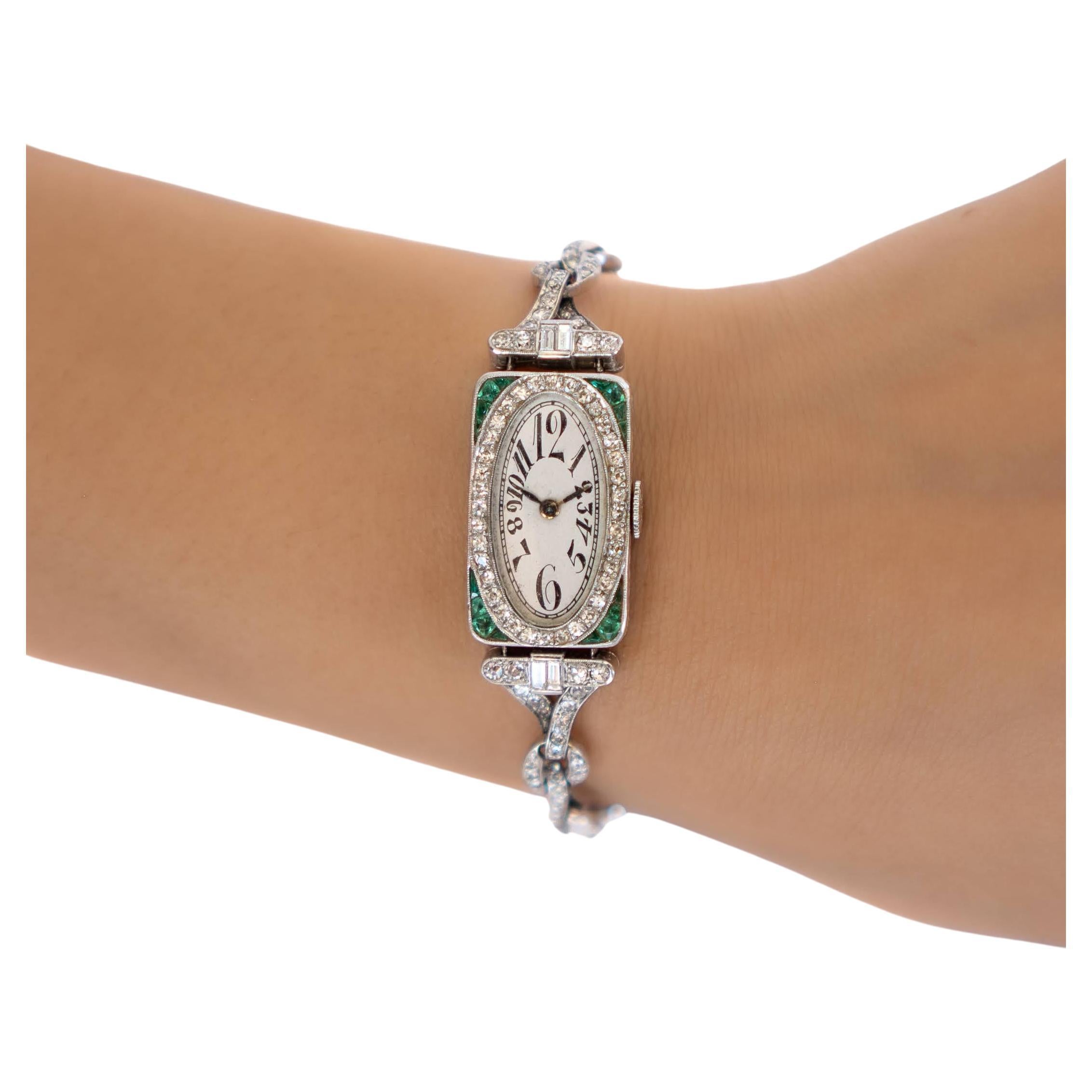Haas Neveux Ladies Vintage Platinum Diamond and Emerald Watch