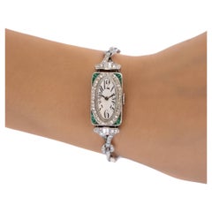 Haas Neveux Ladies Antique Platinum Diamond and Emerald Watch