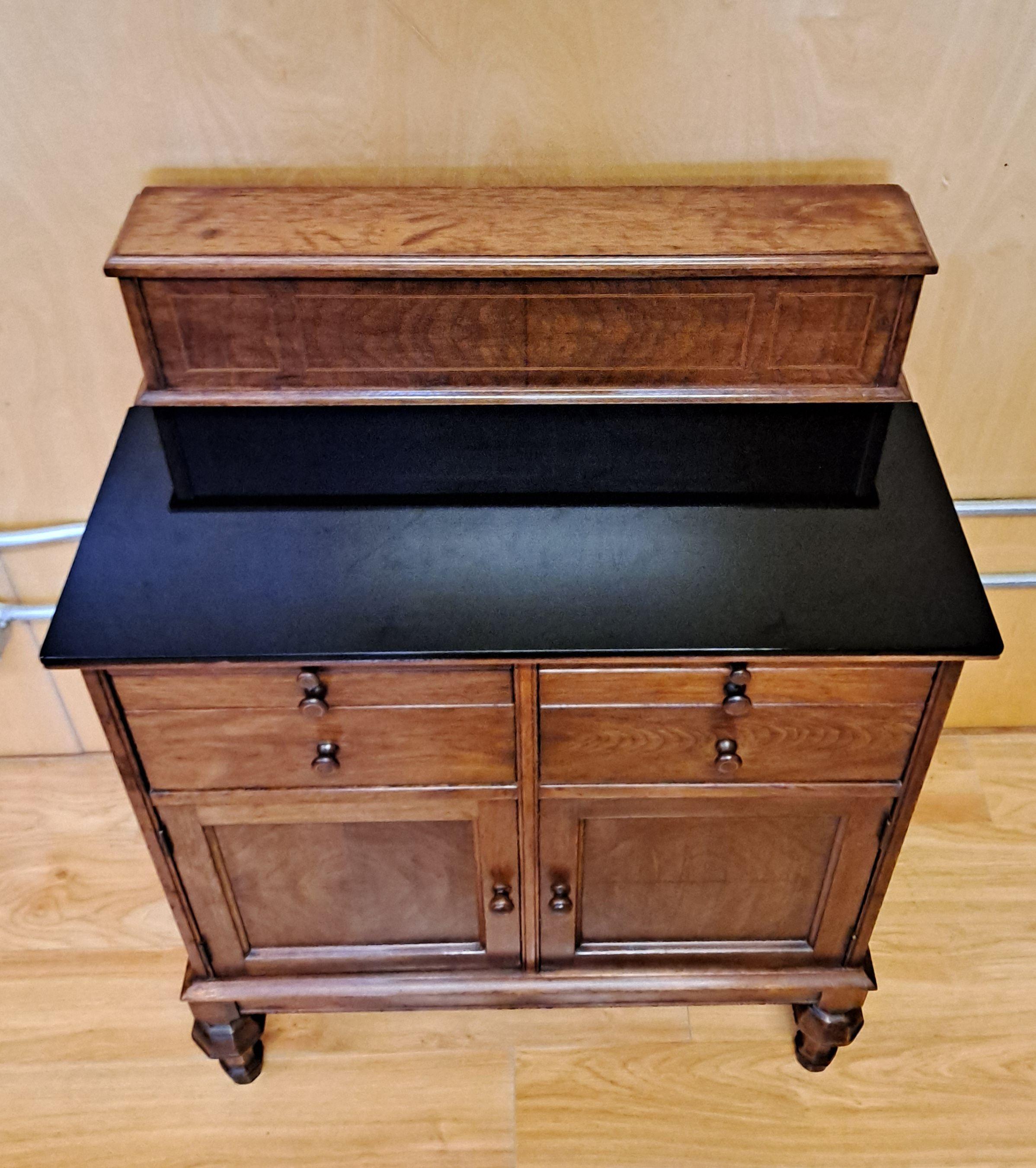 Hamilton MFG CO 1920 Walnut Physician Medical Cabinet 

Top section opens to a rack for medicine bottles 

Painted metal interior drawers w/compartments

one drawer contains 3 original milk glass trays

Bottom of cabinet opens to shelf 

Cabinet has