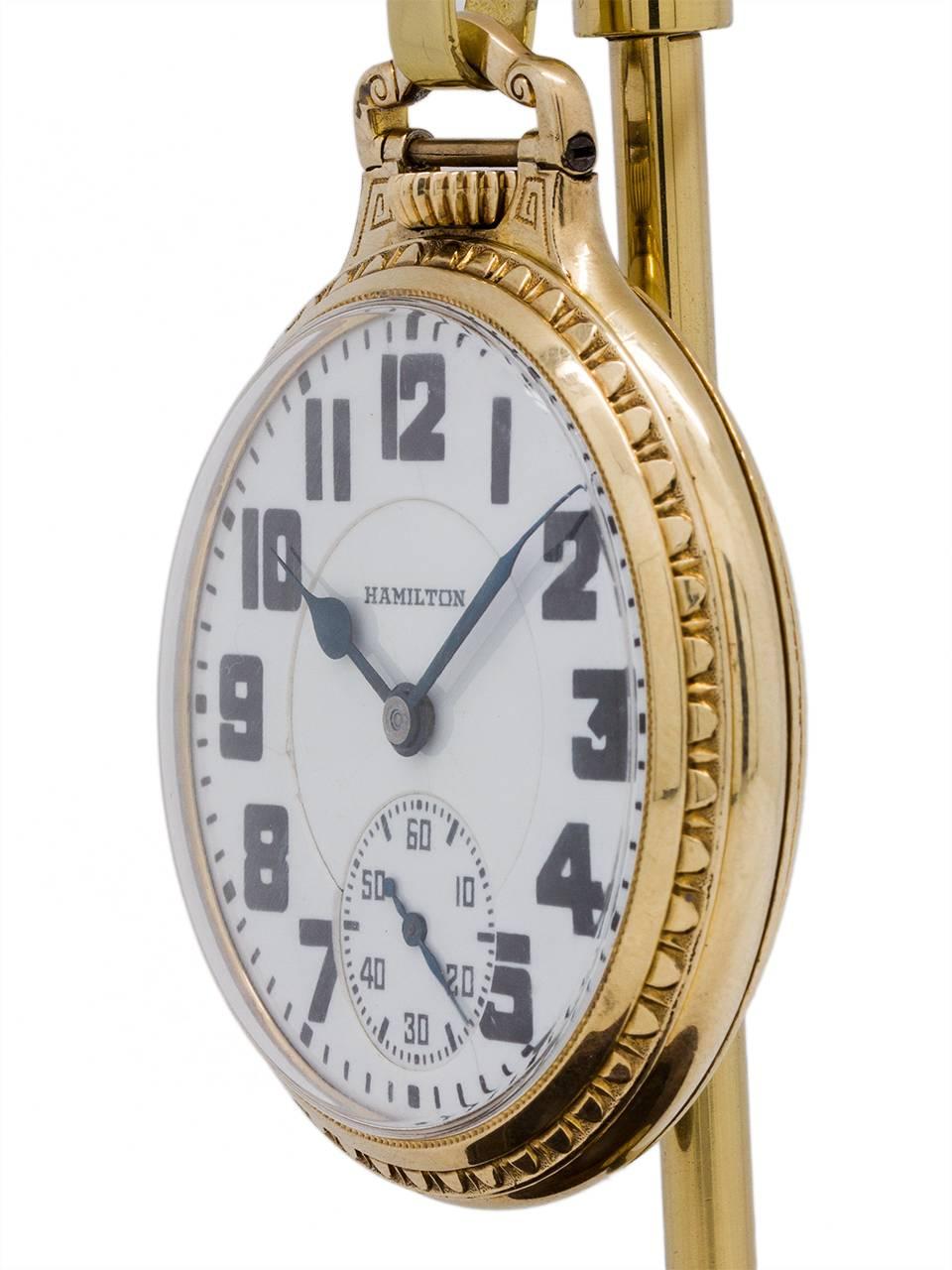
Hamilton Railroad pocket watch grade 992 movement serial # 2.6 million circa 1936. Featuring 16 size 10K yellow gold filled open face case in very nice condition. With very pleasing “double sunk” white enamel dial with bold block style arabic