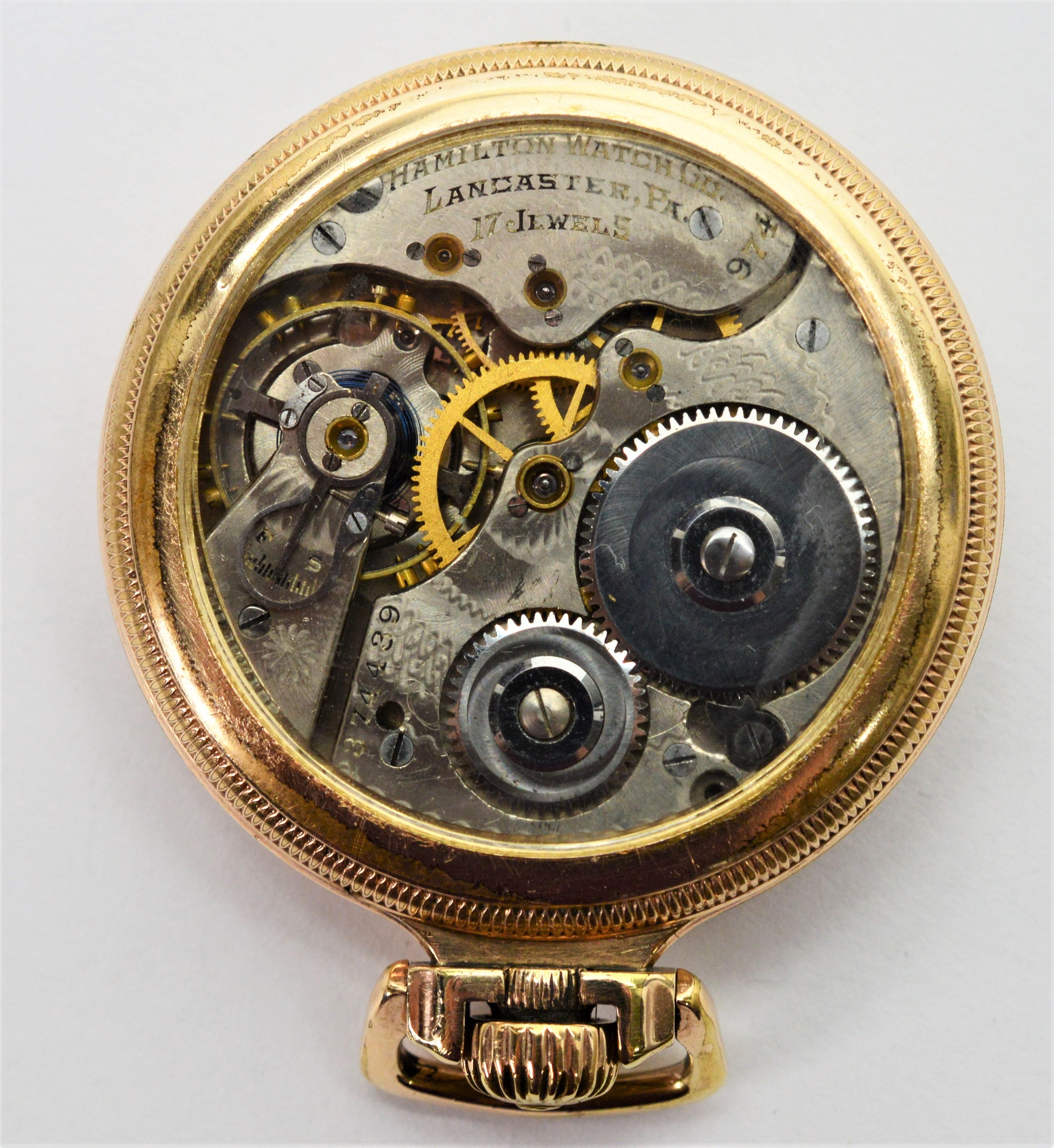 Enjoy owning this heirloom circa 1925 Hamilton Railroad Style Pocket Watch. Set in a brass case with gold plating, this fabulous size 16S American made piece is restored with a display back for a mesmerizing view of its beautiful fancy acid etched