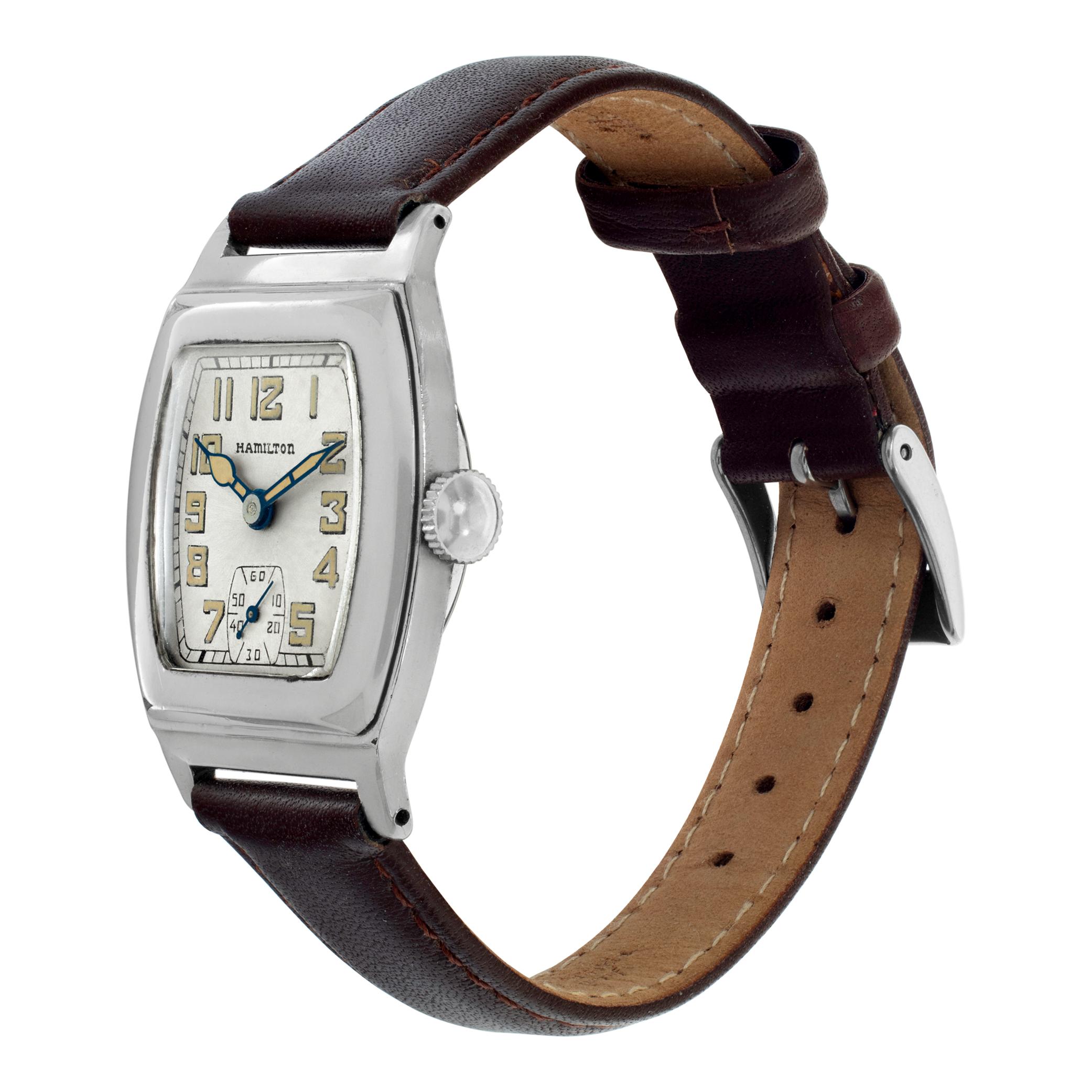 Hamilton Raleigh manual wind watch in white gold fill on a calfskin strap. Auto w/ subseconds. 29 mm case size. Ref 759768. Fine Pre-owned Hamilton Watch.

 Certified preowned Vintage Hamilton Raleigh watch on a Brown calfskin band with a Stainless