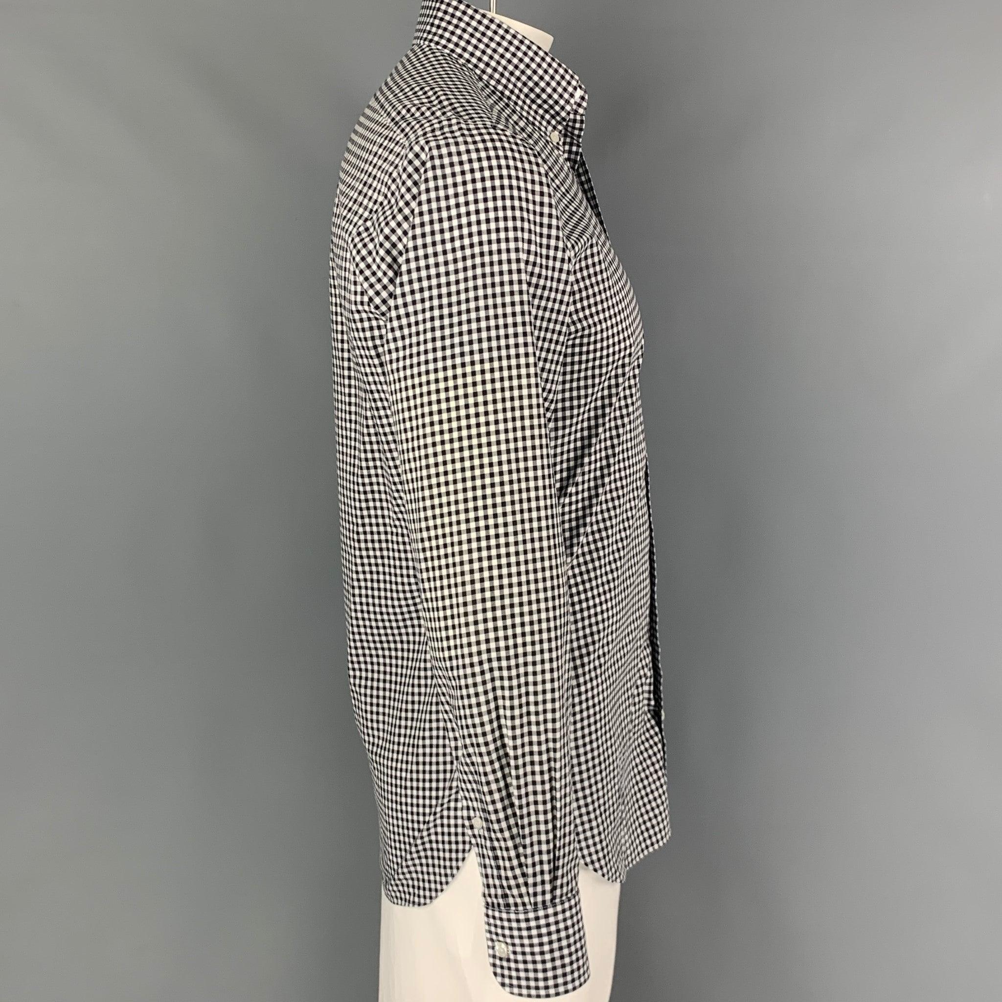 HAMILTON long sleeve shirt comes in a black & white gingham material featuring a classic style, button down collar, and a button up closure. Excellent
Pre-Owned Condition. Fabric tag removed.  

Marked:   MARCH18  

Measurements: 
 
Shoulder: 18