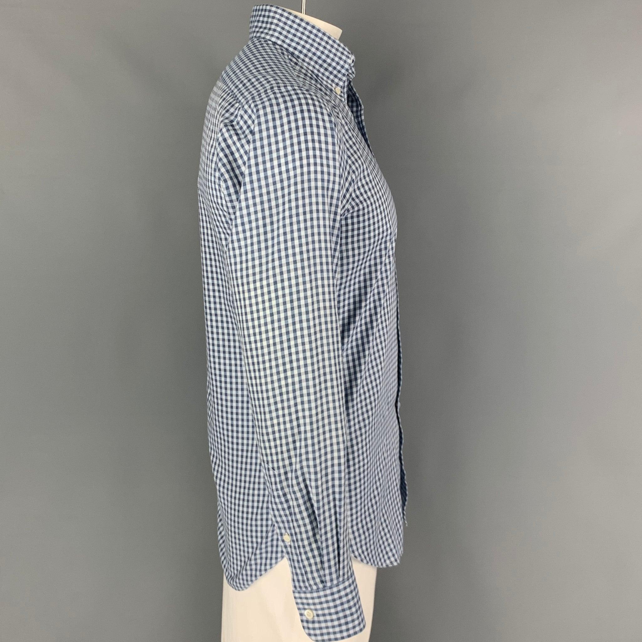 HAMILTON long sleeve shirt comes in a blue & light blue gingham material featuring a classic style, button down collar, and a button up closure. Excellent
Pre-Owned Condition. Fabric tag removed.  

Marked:   MARCH18  

Measurements: 
 
Shoulder: 18