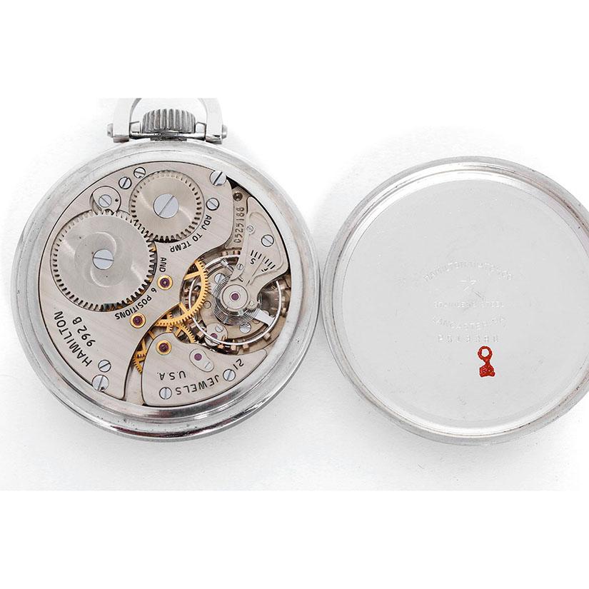 Hamilton Stainless Steel Railway Special Pocket Watch 922B -  Manual winding; 21 Jewels. Stainless steel ( 50 mm ). White enamel Hamilton double sunk Montgomery dial, features Art Deco Arabic hour numerals. The dial is signed 