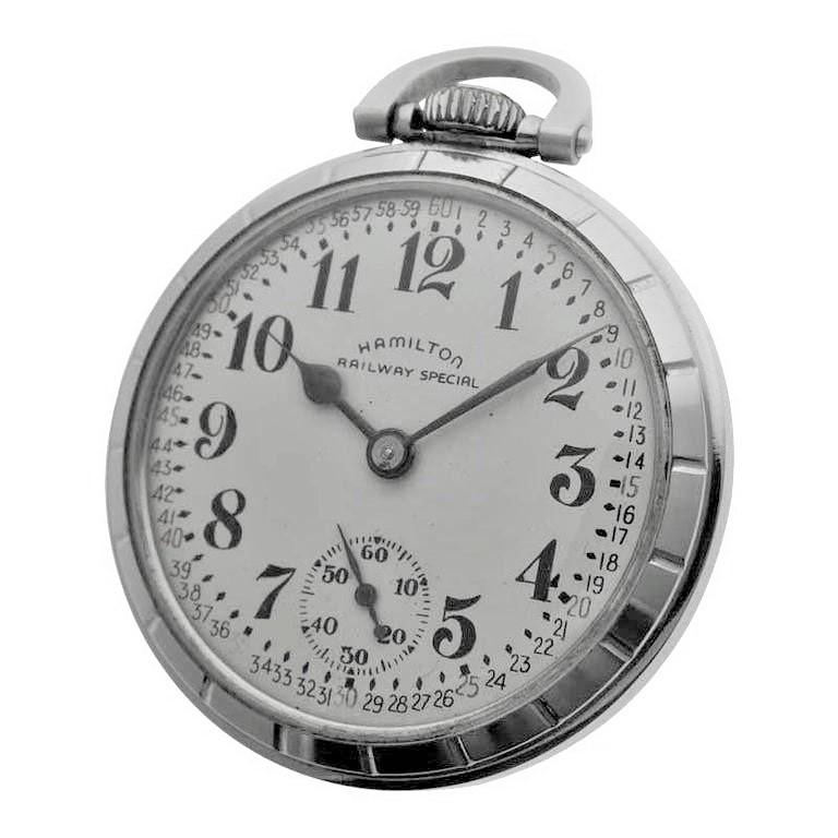 FACTORY / HOUSE: Hamilton Watch Company
STYLE / REFERENCE: Open Faced Railroad Watch
METAL / MATERIAL: Stainless Steel 
CIRCA / YEAR: 1942-1943
DIMENSIONS / SIZE: 50mm
MOVEMENT / 770 CALIBER: Manual Winding / 21 Jewels /Cal. 992B
DIAL / HANDS: