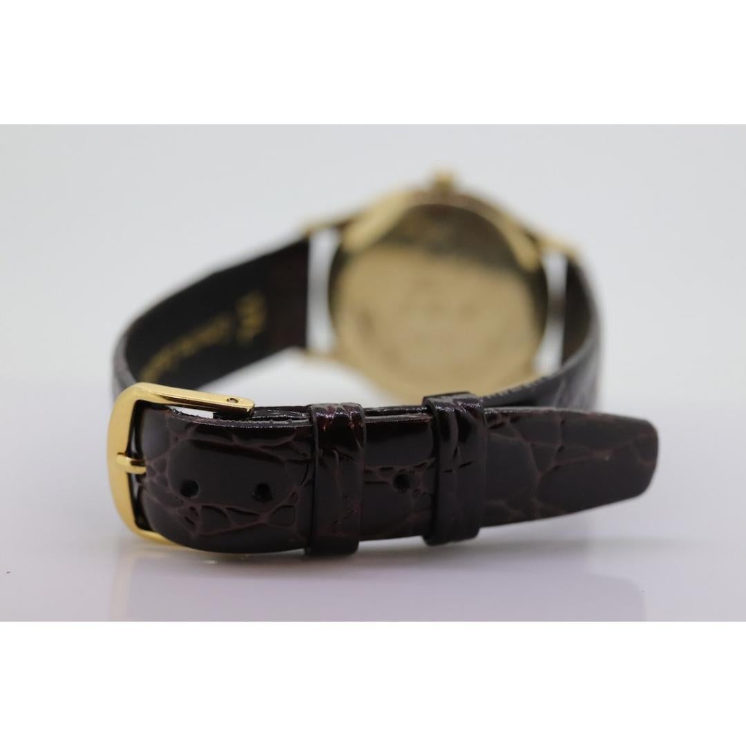 HAMILTON THIN o MATIC Watch. 14k Yellow Gold Round Hamilton wristwatch. Hamilton In Good Condition For Sale In Port Charlotte, FL