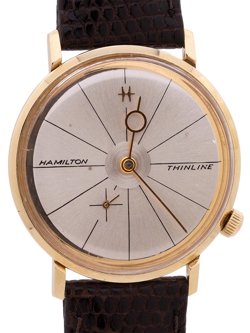 
Hamilton Thinline 4002, a classic design 10K yellow gold filled model from circa 1962. The case measures 33mm, with thin angled lugs, snap down case back, and crown at 4 o’clock. The Thinline 4002 was introduced in 1962, but was destined to only be