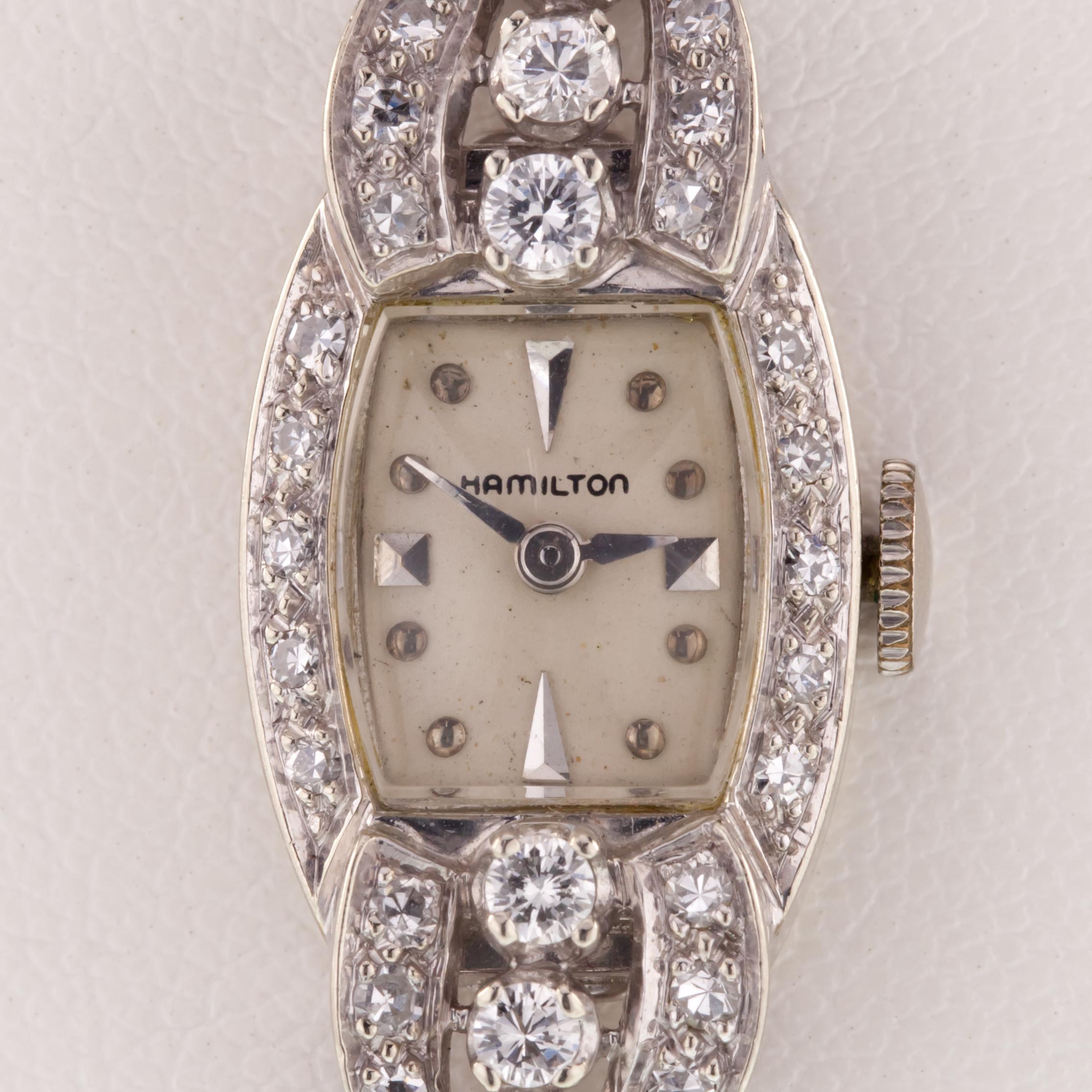 Hamilton Vintage 14k White Gold Women's Diamond Dress Watch
Movement #757
Production Decade: 1950s
14k White Gold Case w/ Diamond Accents
14 mm Wide (15 mm w/ Crown)
Lug-to-Lug Distance = 33 mm
Thickness = 6 mm
Beige Dial w/ Silver Tic Marks and