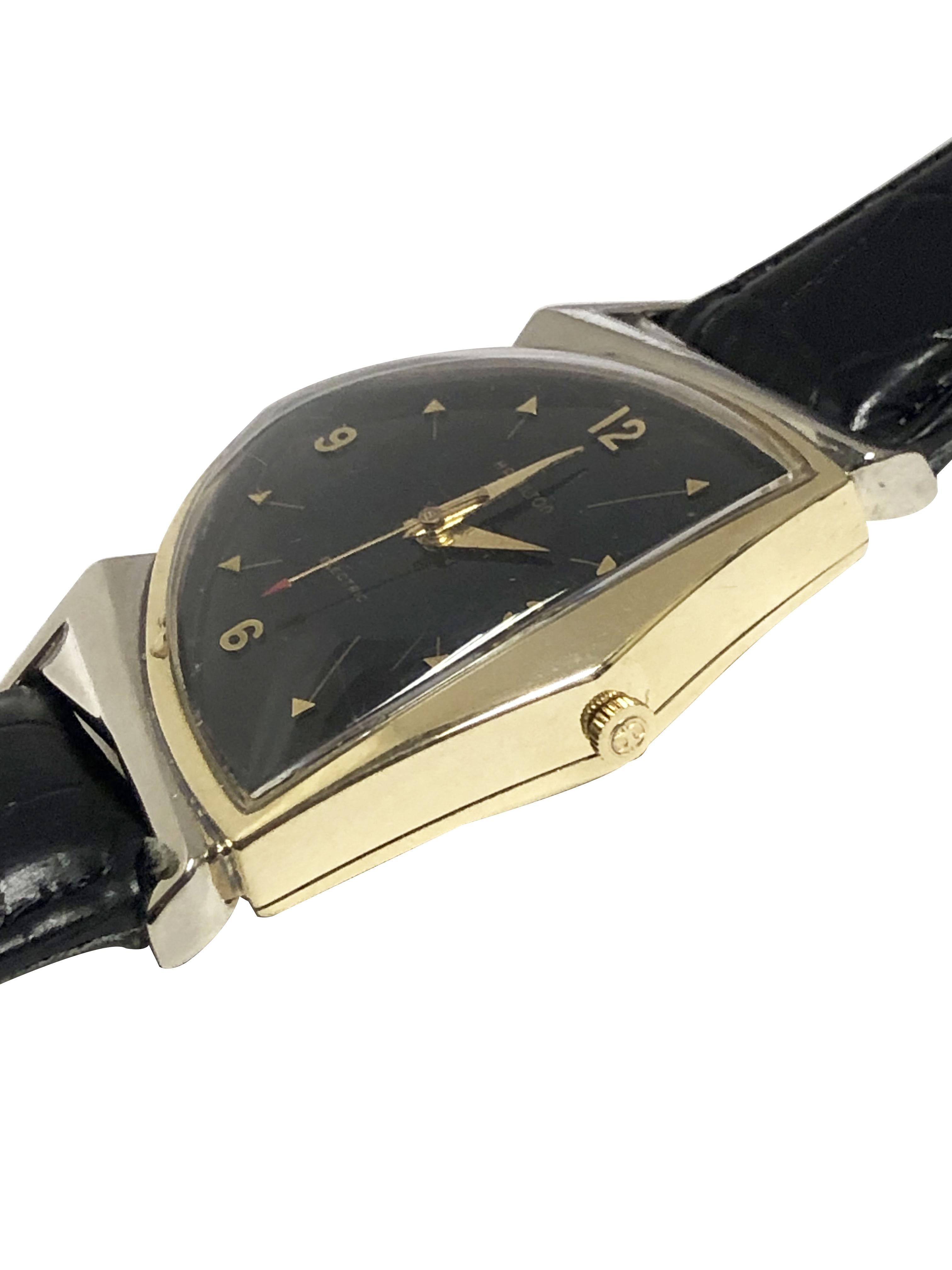 Circa 1960 Hamilton Pacer Wrist Watch 45 M.M  X  32 M.M. 10k Gold Filled two piece case. Hamilton 500 Electric Movement, Original Black Dial with Raised Gold markers, original Hands.  New Black Croco grain Leather strap. Recently reconditioned and