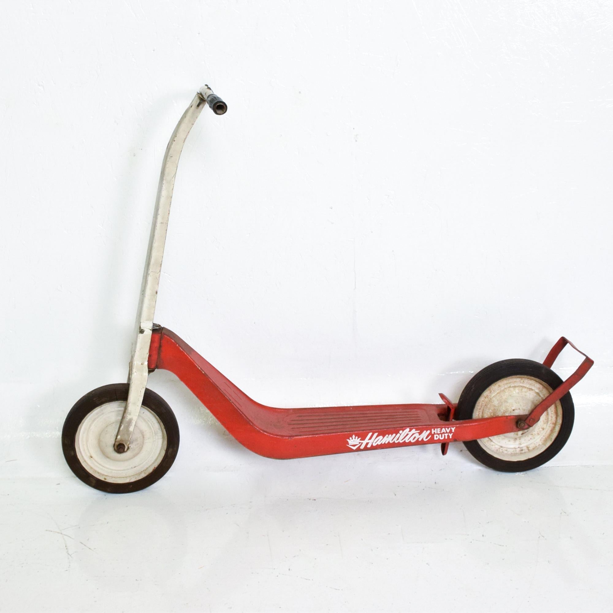 For your consideration: Fabulous fun vintage Mid-Century Modern red Hamilton scooter heavy duty.
Metal push scooter retro radio 2 wheel scooter kick start foot brake kick stand.
The USA, 1950s
Dimensions: 40 D x 31.5 H x 12 W.
Scooter will be