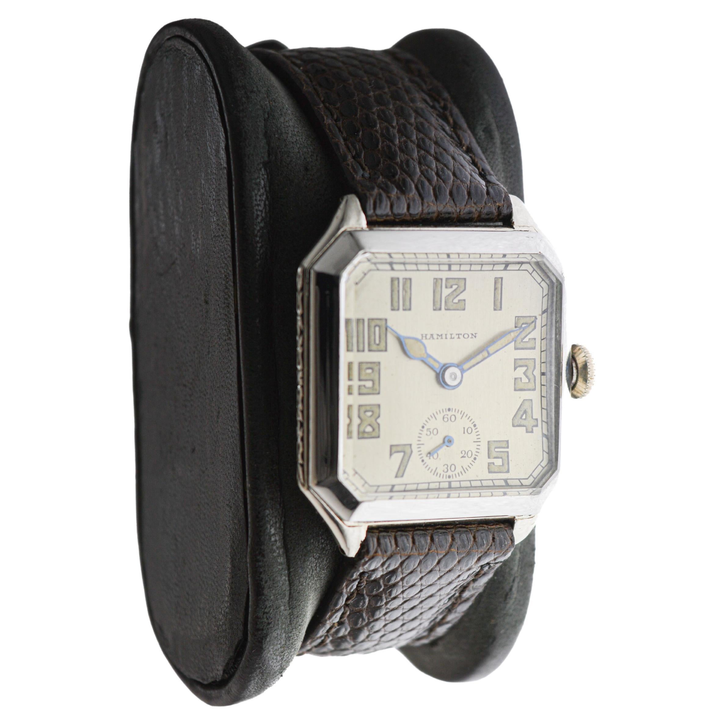 FACTORY / HOUSE: Hamilton Watch Company
STYLE / REFERENCE: Art Deco / Octagon Shape
METAL / MATERIAL: White Gold Filled
CIRCA / YEAR: 1931
DIMENSIONS / SIZE: Length 29mm X Width 34mm
MOVEMENT / CALIBER: Manual Winding / 17 Jewels / Caliber 987
DIAL