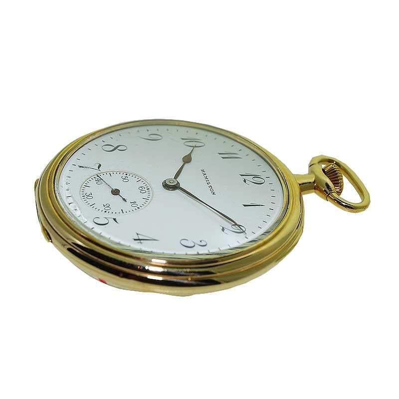 FACTORY / HOUSE: Hamilton Watch Company
STYLE / REFERENCE: Open Faced Pocket Watch 
METAL / MATERIAL: Yellow Gold Filled
CIRCA / YEAR: 1921
DIMENSIONS / SIZE: 47 mm 
MOVEMENT /10 CALIBER: Manual Winding / 17 Jewels 
DIAL / HANDS: Kiln Fired Enamel