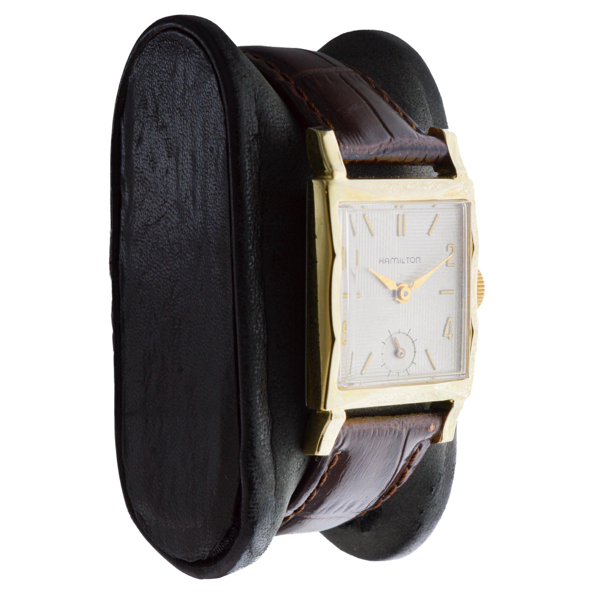 FACTORY / HOUSE: Hamilton Watch Company
STYLE / REFERENCE: Art Deco / Tank Style
METAL / MATERIAL: Yellow Gold Filled
CIRCA / YEAR: 1940's
DIMENSIONS / SIZE: Length 39mm 