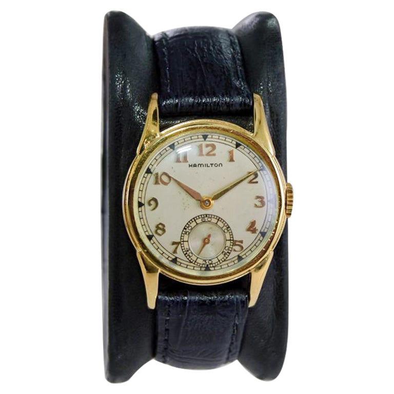 FACTORY / HOUSE: Hamilton Watch Company
STYLE / REFERENCE: Art Deco / Calatrava Style
METAL / MATERIAL: Yellow Gold Filled
CIRCA / YEAR: 1940's
DIMENSIONS / SIZE: Length 38mm X Diameter 28mm
MOVEMENT / CALIBER: Manual Winding / 17 Jewels / Caliber