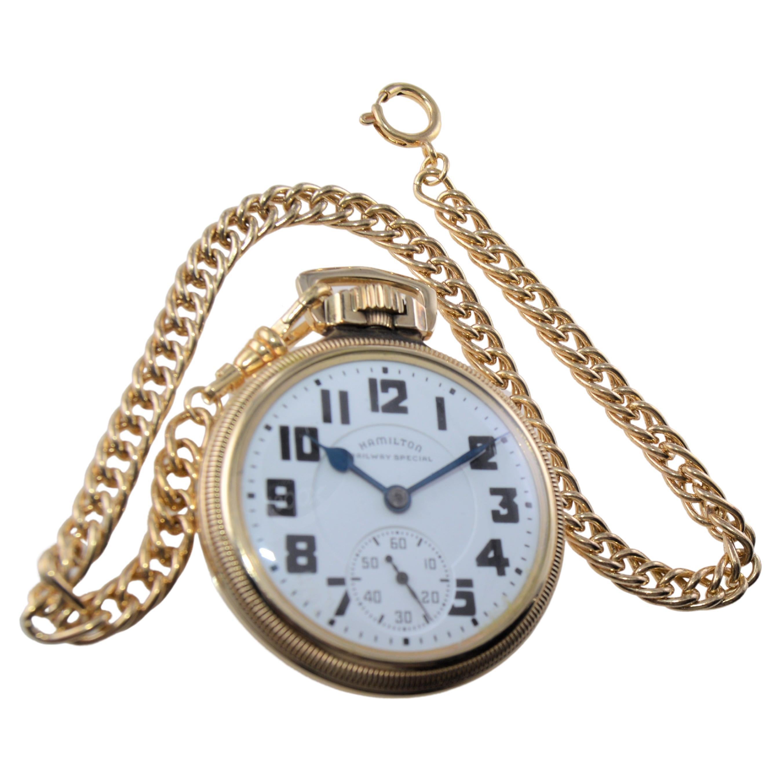FACTORY / HOUSE: Hamilton Watch Company
STYLE / REFERENCE: Open Faced Pocket Watch
METAL / MATERIAL: Yellow Gold Filled
CIRCA / YEAR: 1940's
DIMENSIONS / SIZE: Diameter 57mm
MOVEMENT / CALIBER: Manual Winding / 21 Jewels / Caliber 992B
DIAL / HANDS: