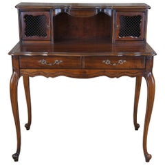 Bureau provincial Louis XV en bois fruitier pour dame de chambre Hammary