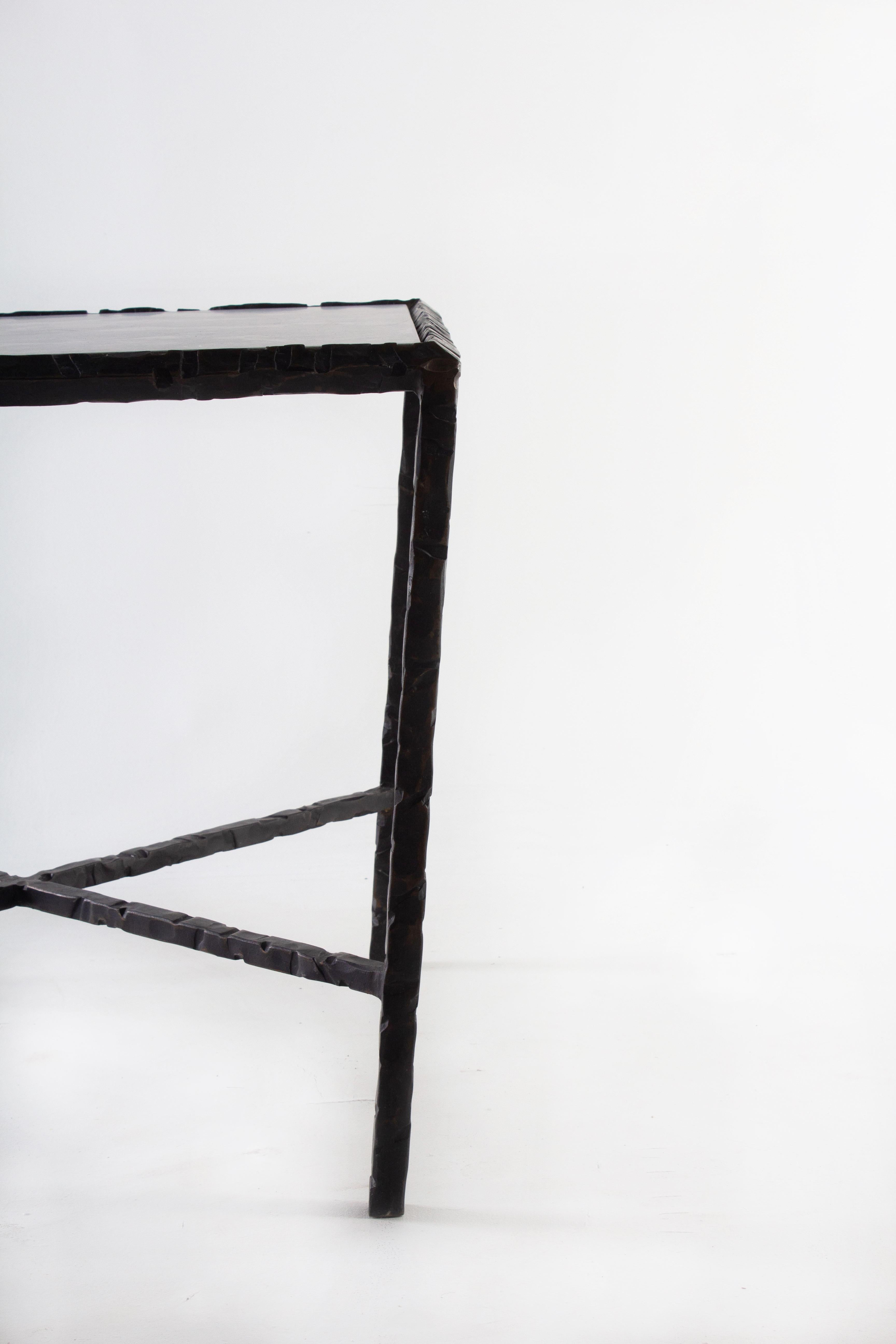 Hammered steel bronze patina end table. Lagos Azul.