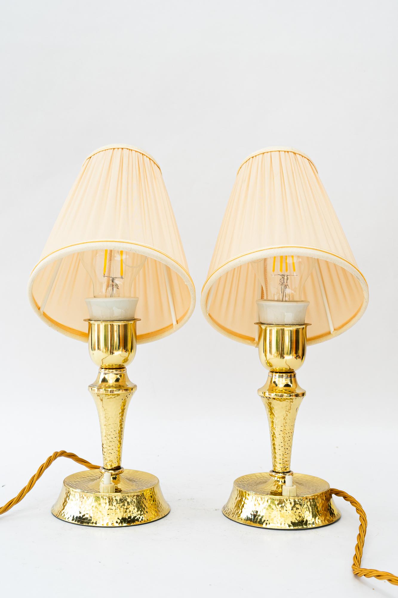 Austrian Hammered art deco brass table lamp with fabric shades vienna around 1920s For Sale