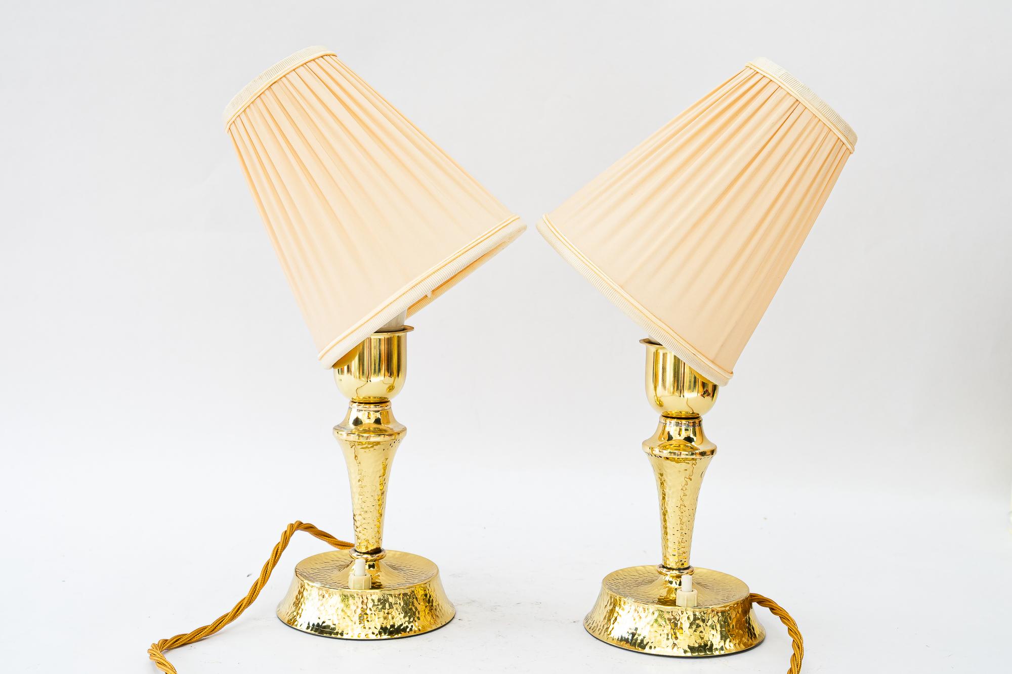 Early 20th Century Hammered art deco brass table lamp with fabric shades vienna around 1920s For Sale