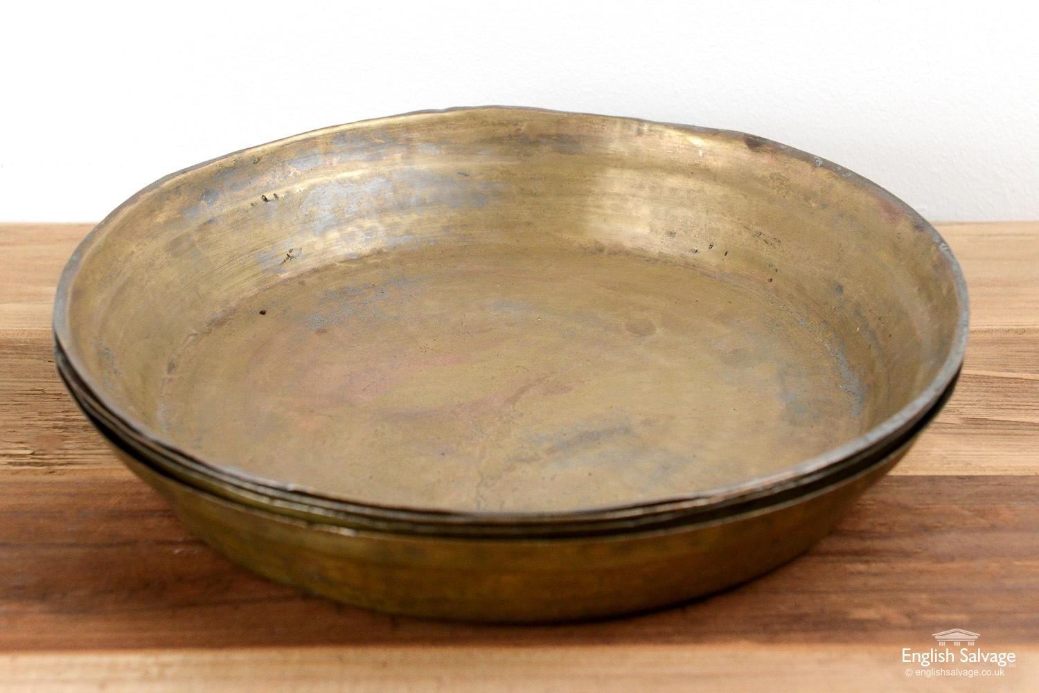 brass plates and bowls